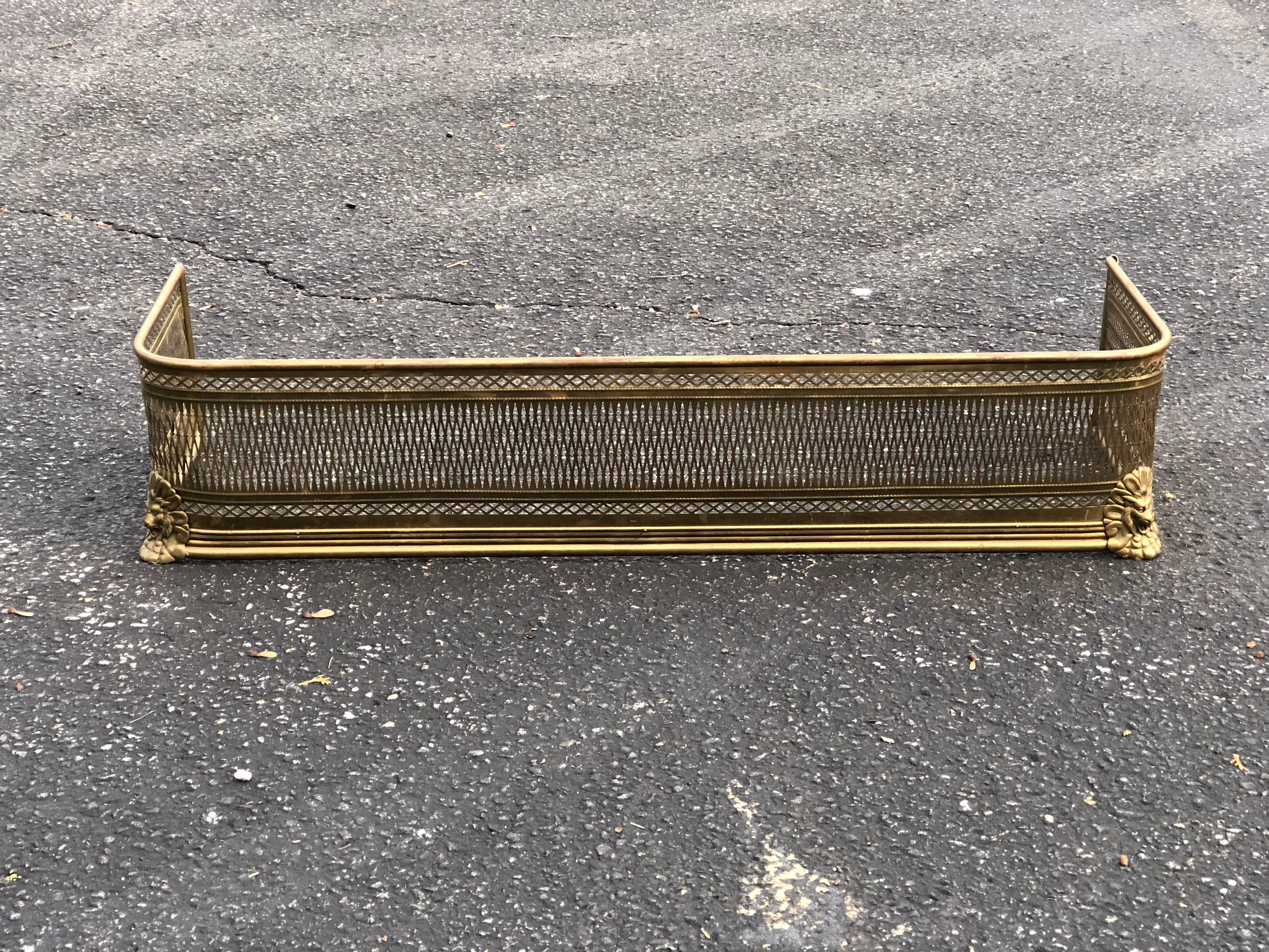 Pierced Brass Fireplace Fender with Lions. Nice polished Brass finish.Perfect decoration around your fireplace. 