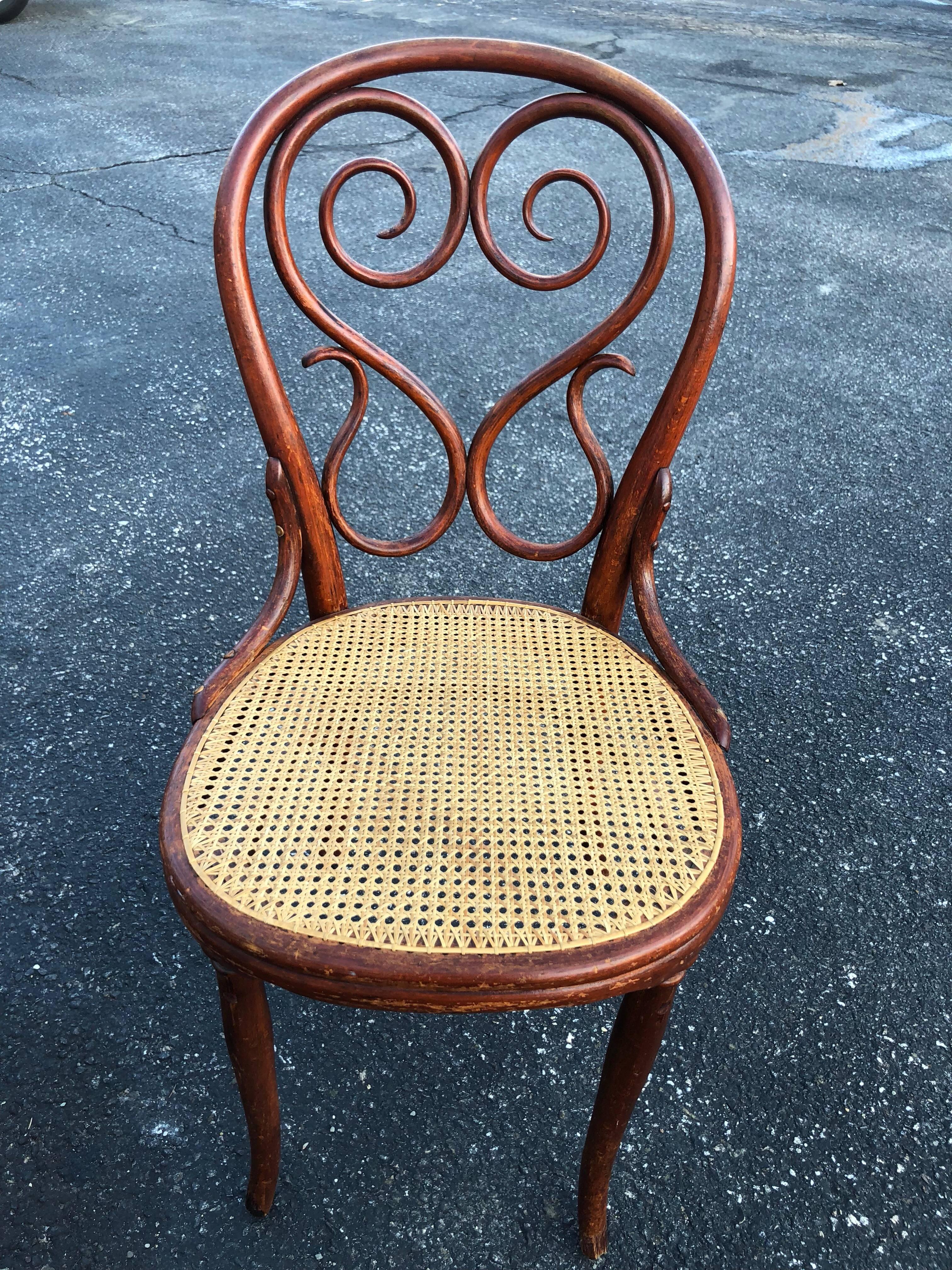 Vintage Thonet chair with caned seat and exquisite heart shaped scrolled back.
Seat depth is 17. Final markdown. Clearance price.