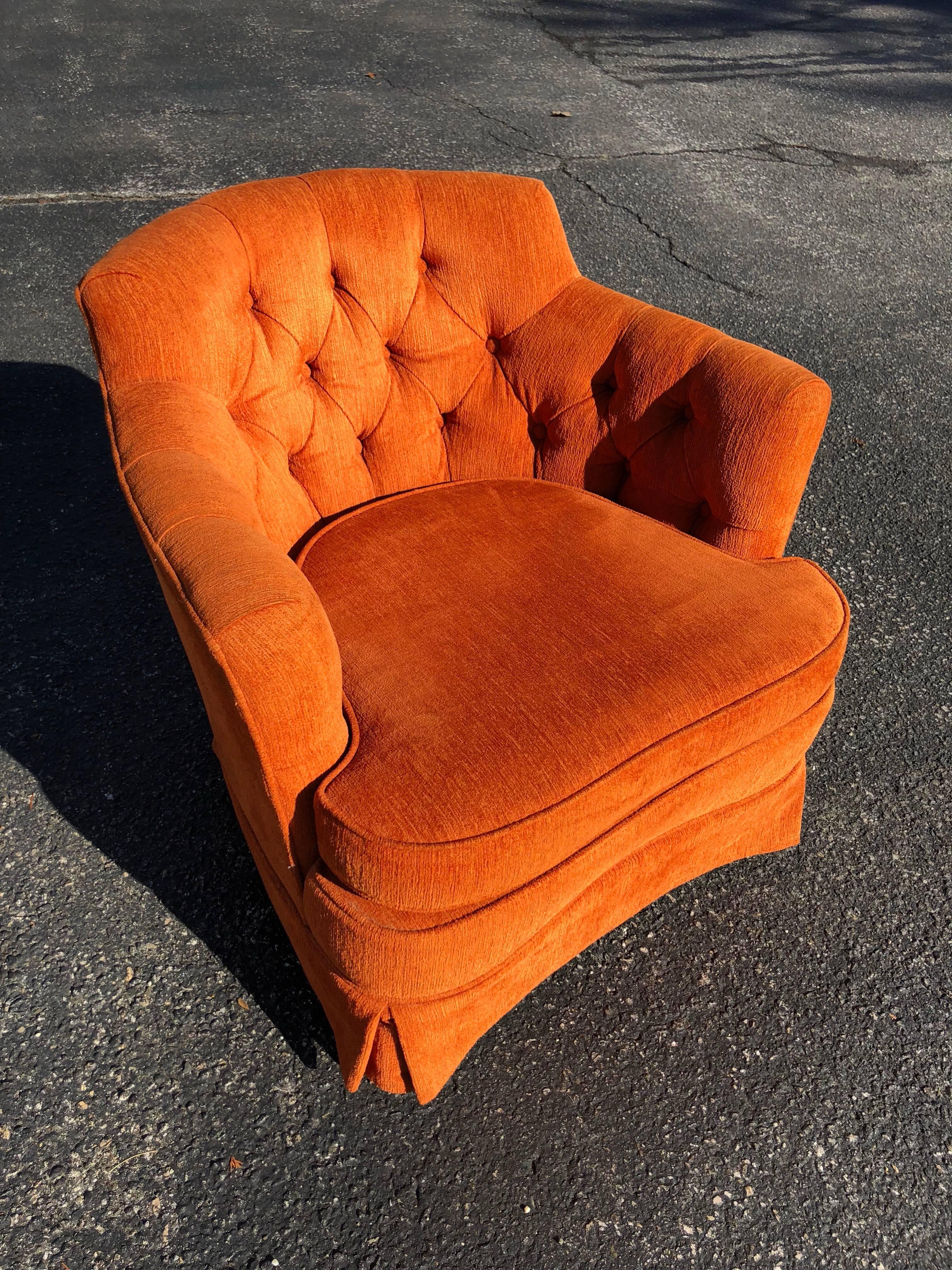 orange tufted chair