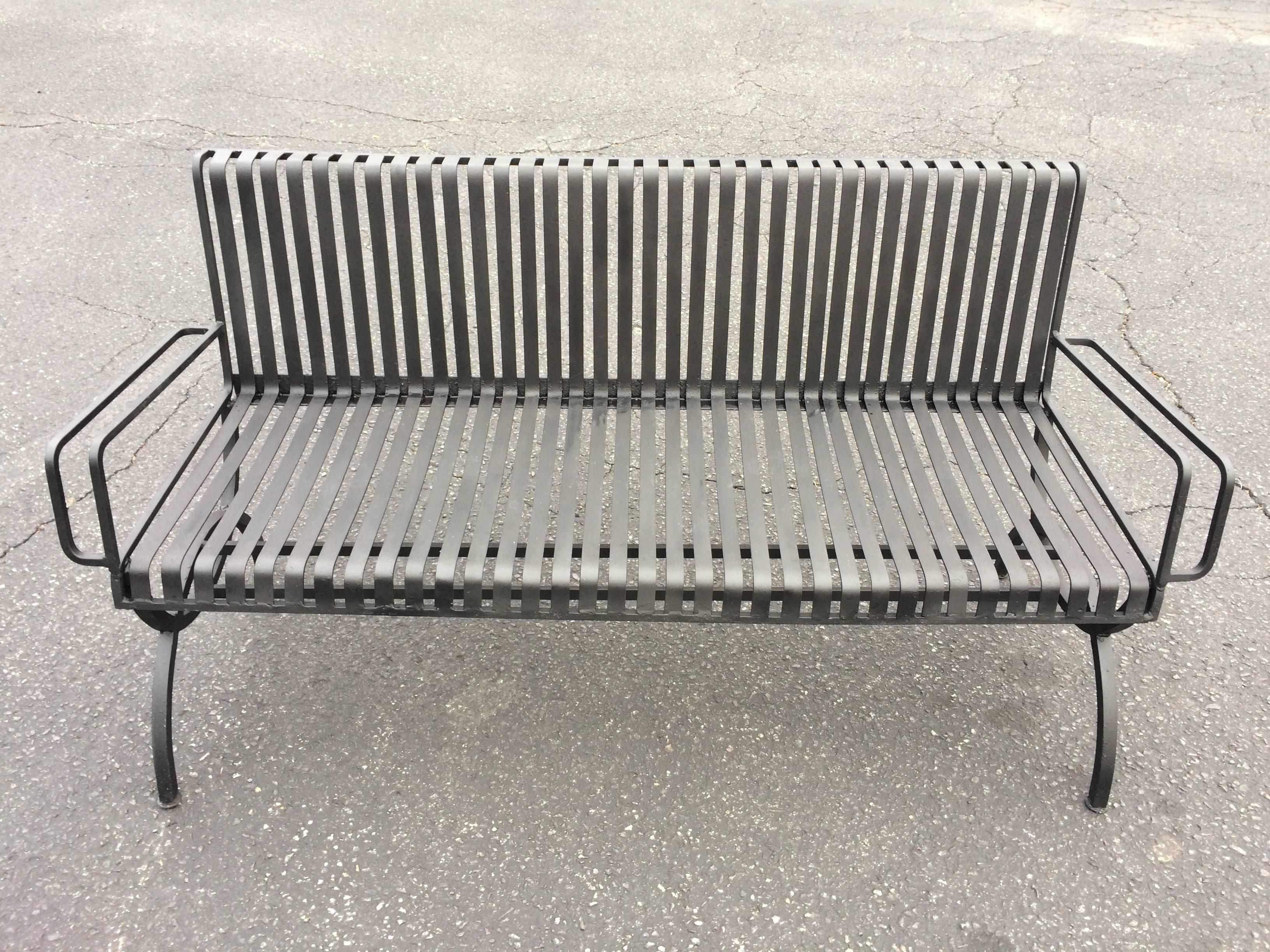 Rare handmade Mid-Century Steel bench. Great lines. A perfect accent piece to a garden or patio.Fully restored.Gray black finish