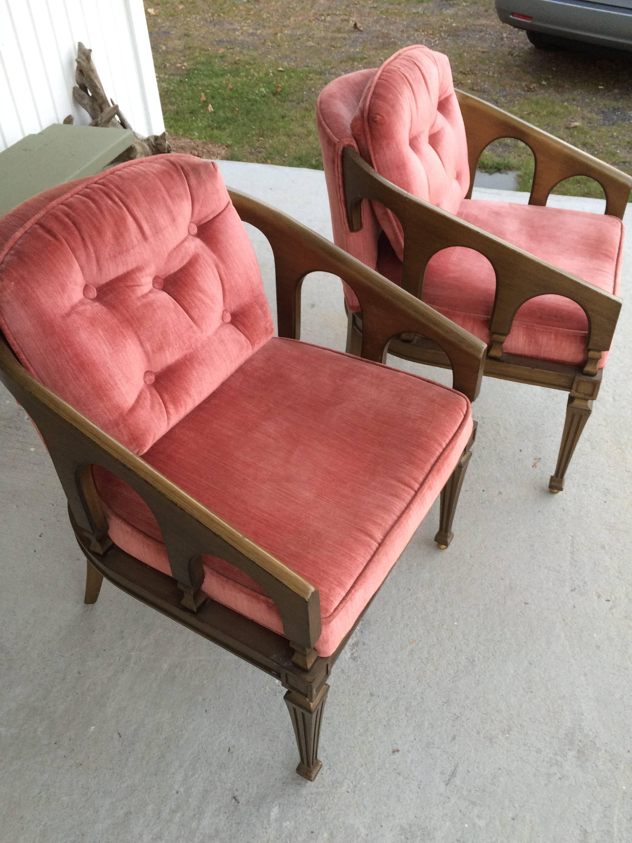 Pair of Hollywood Regency Chairs. A cross between the Brady Bunch and Madmen .These Hollywood Regency meets Brutalist style chairs are covered in their original pink velvet.