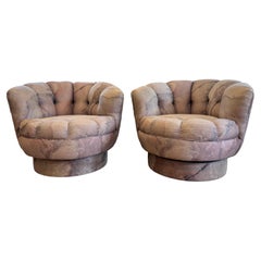 Pair of 1980’s Scalloped Swivel Chairs