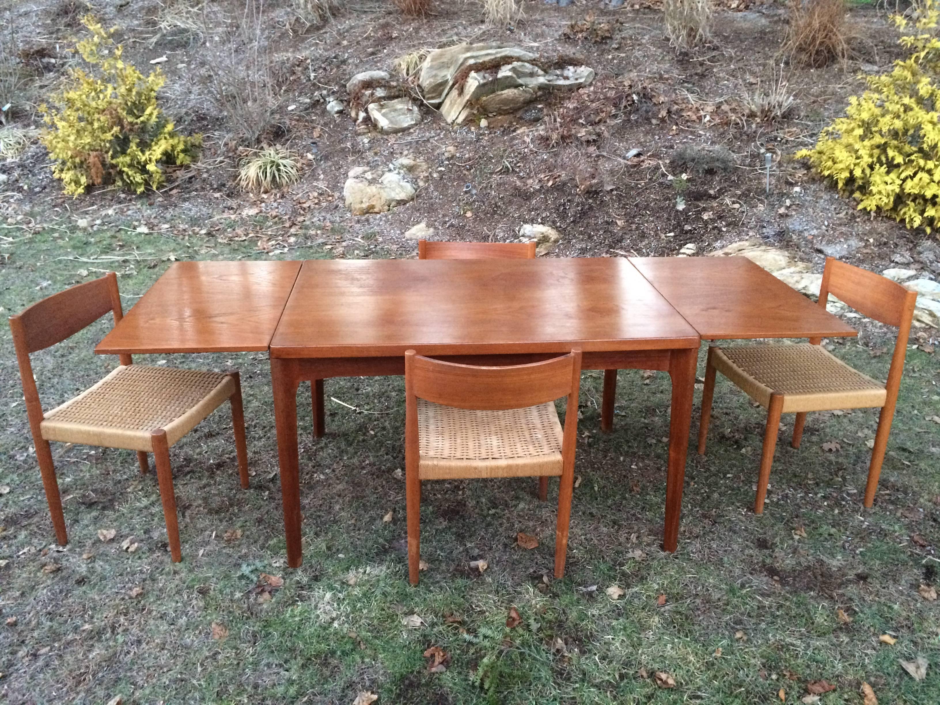 Mid-Century Modern Danish Modern Extendable Teak Dining Table with Woven Chairs