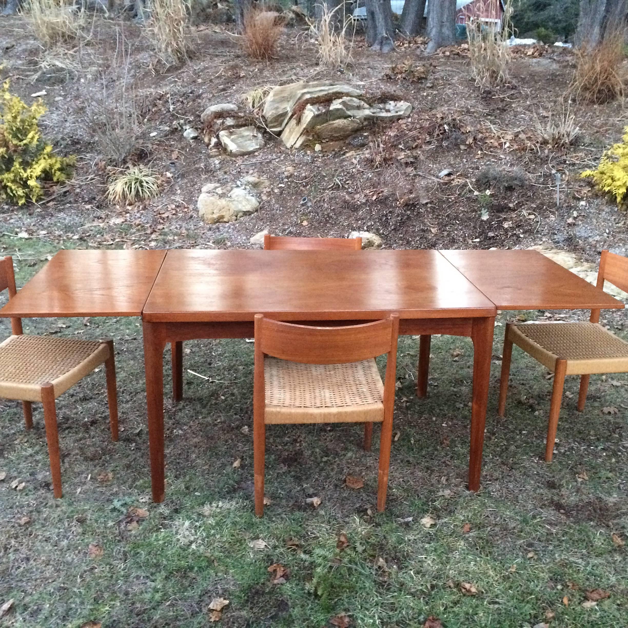 Danish Modern Extendable Teak Dining Table with Woven Chairs In Good Condition In Redding, CT