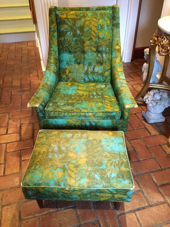 Rare Mid-Century Selig armchair with matching Ottoman. Funky original fabric adorns this retro gem. Sleek lines and killer profile make this a must have. There is only one chair in the listing with a matching ottoman. Therefore two items make up the