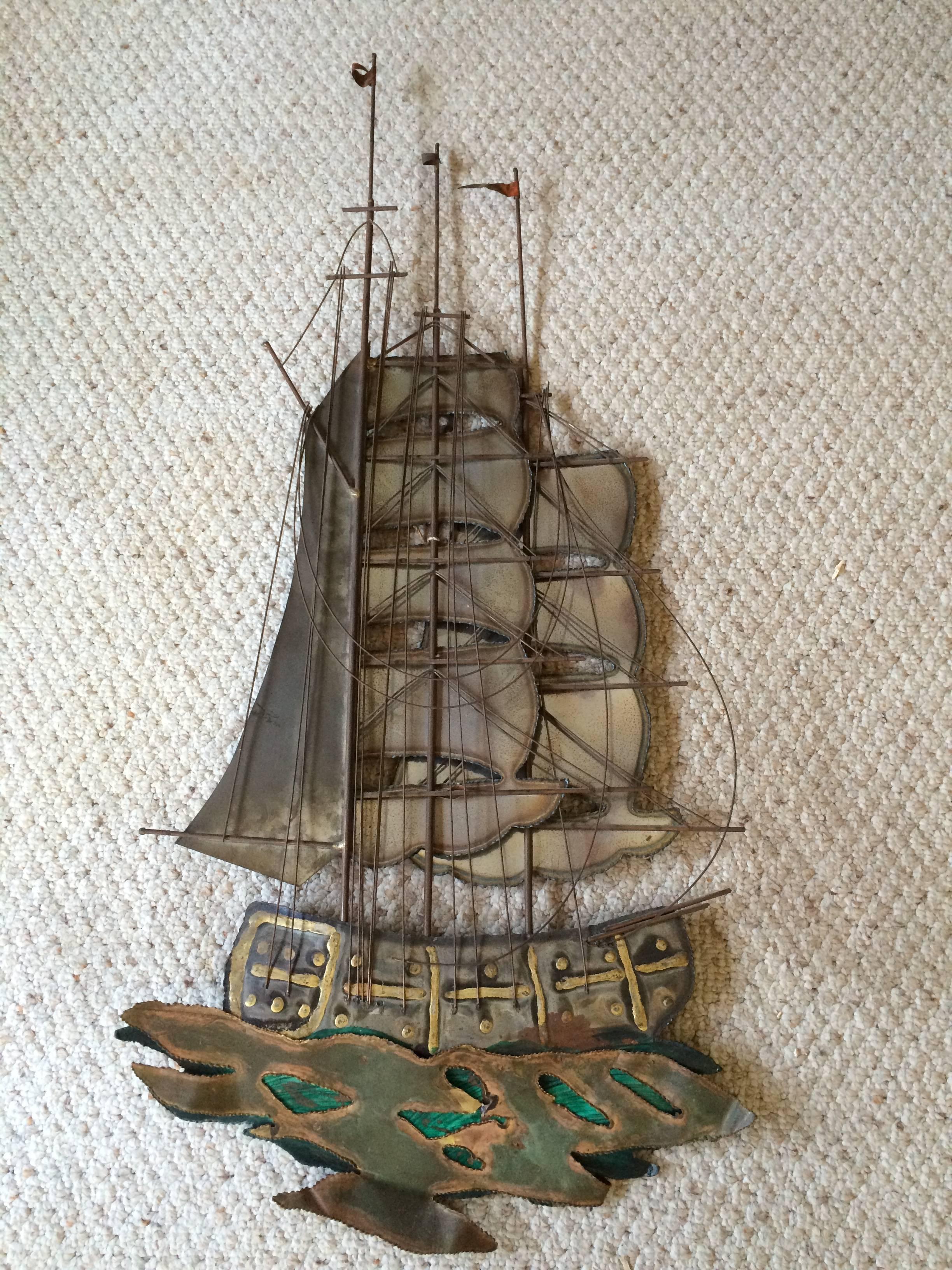 Brutalist Mid Century Ship Wall Sculpture. Mixed torch cut metals with painted accents. 