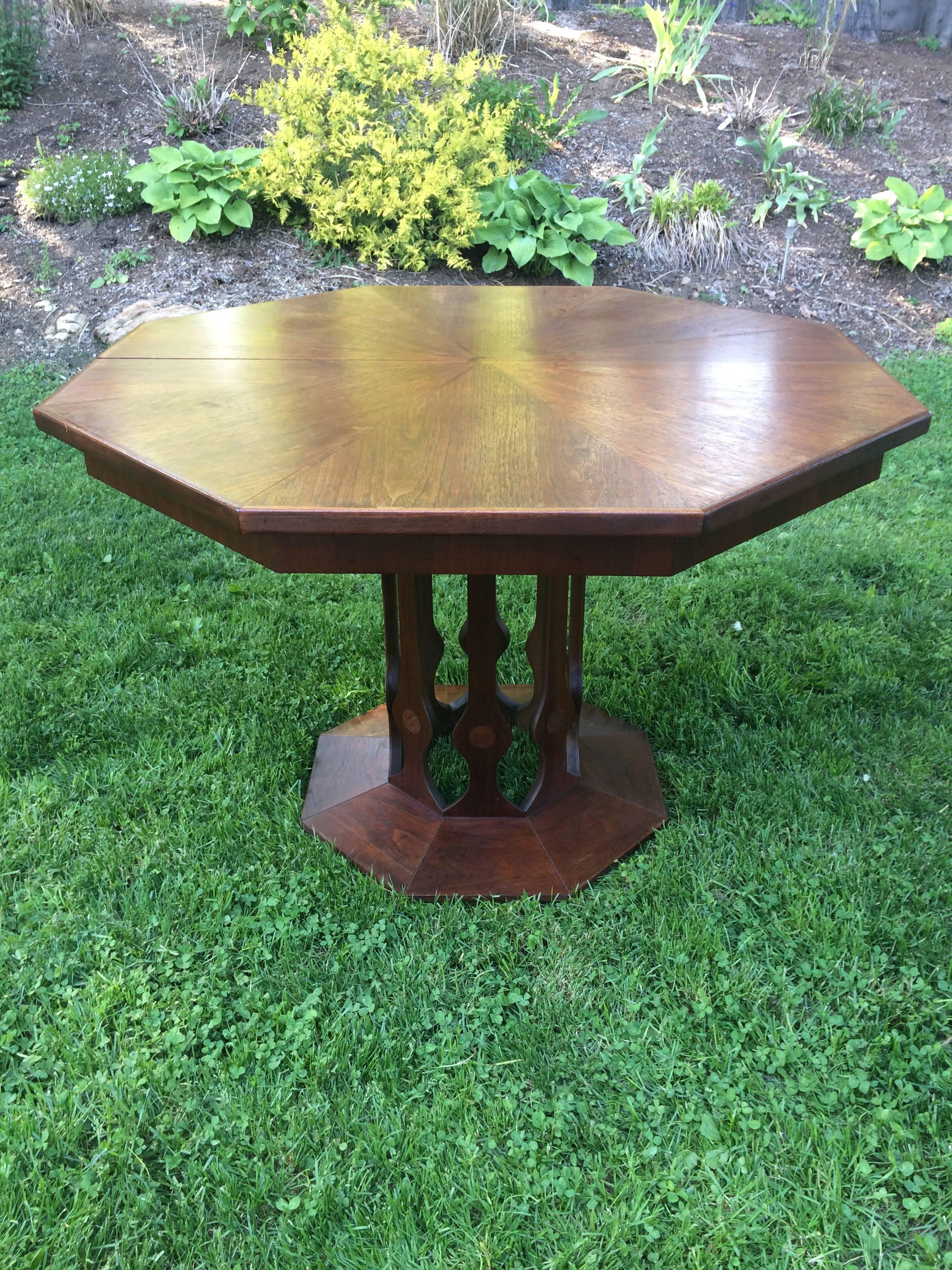 Foster-McDavid octagonal walnut table. This beauty is reminiscent of Harvey Probber designs. This table is meant to expand with leaves but sadly there are no leaves.