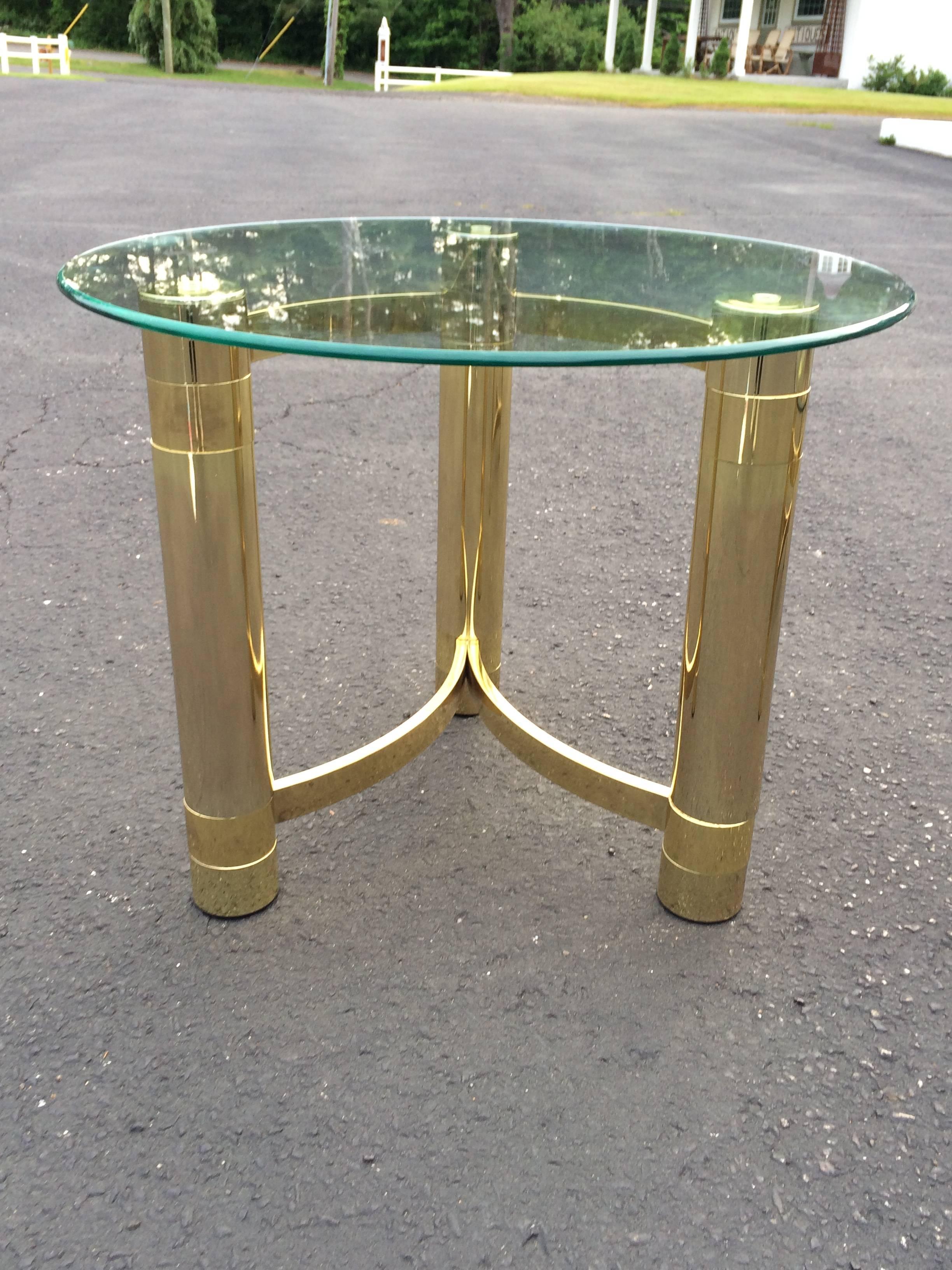 Hollywood Regency brass and glass side table. Simple organic , clean lines. Matching coffee table has already sold.