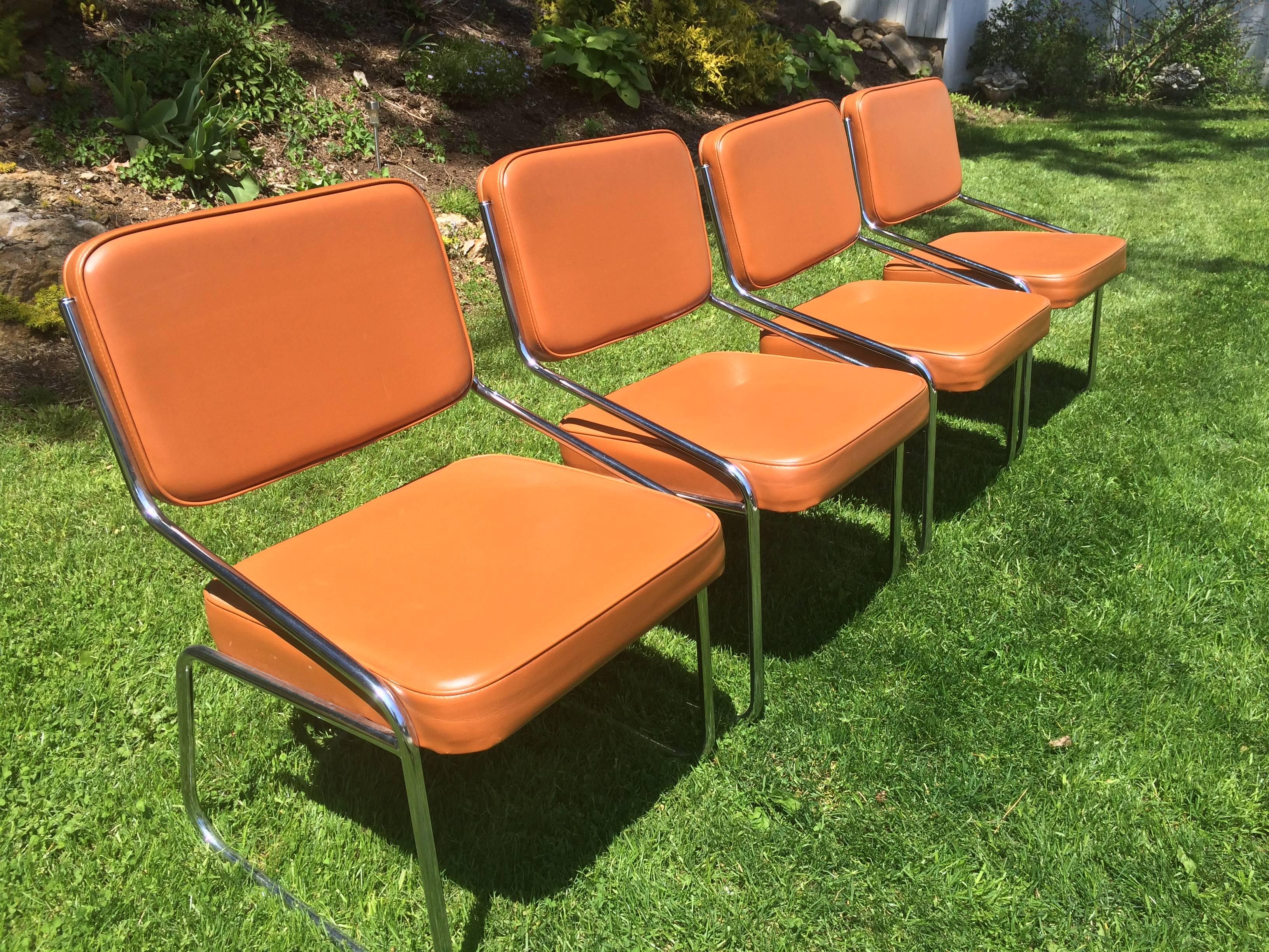 Mid-Century Modern Set of Four Chrome and Vinyl Chairs