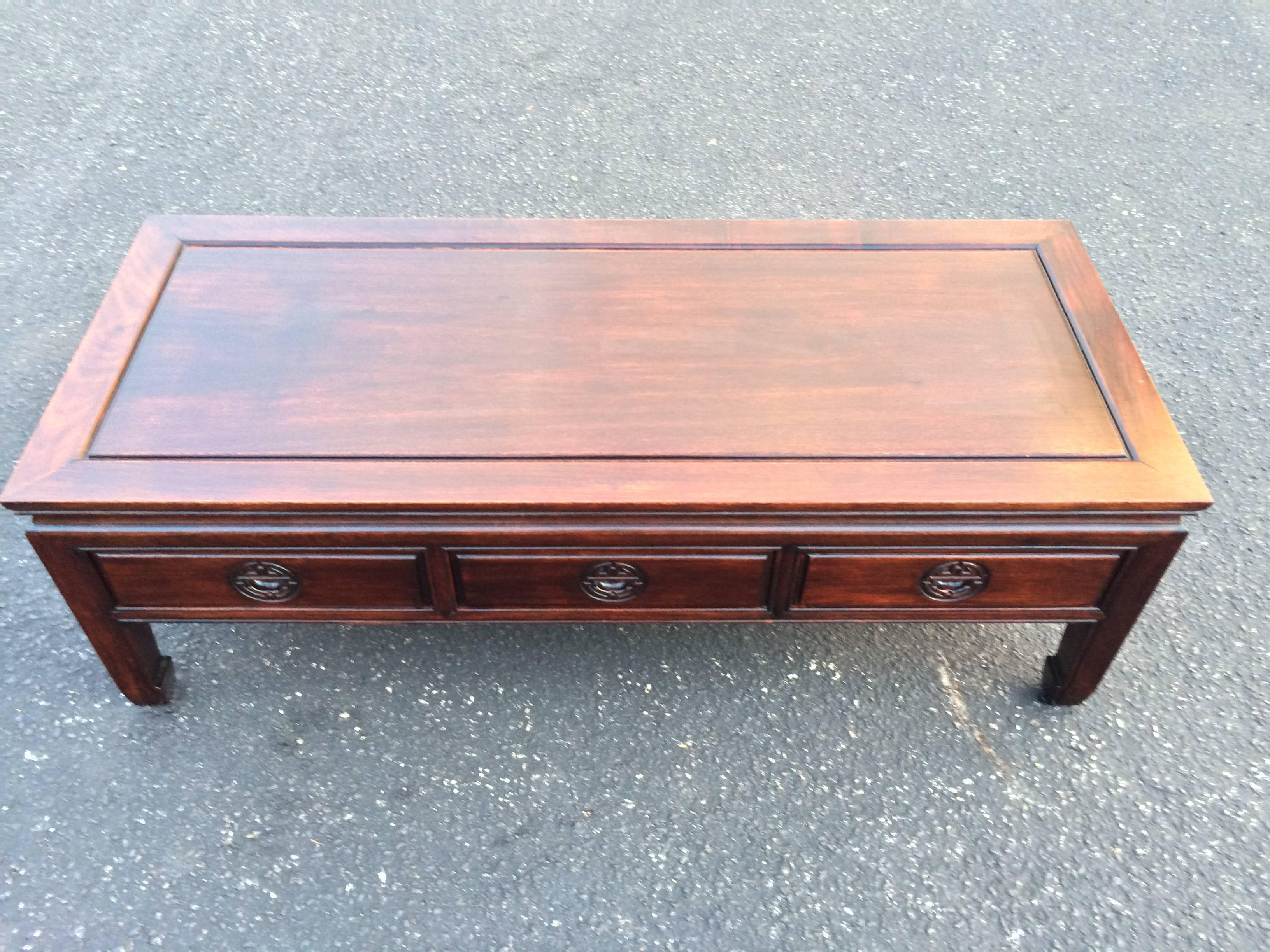rosewood coffee table with drawers