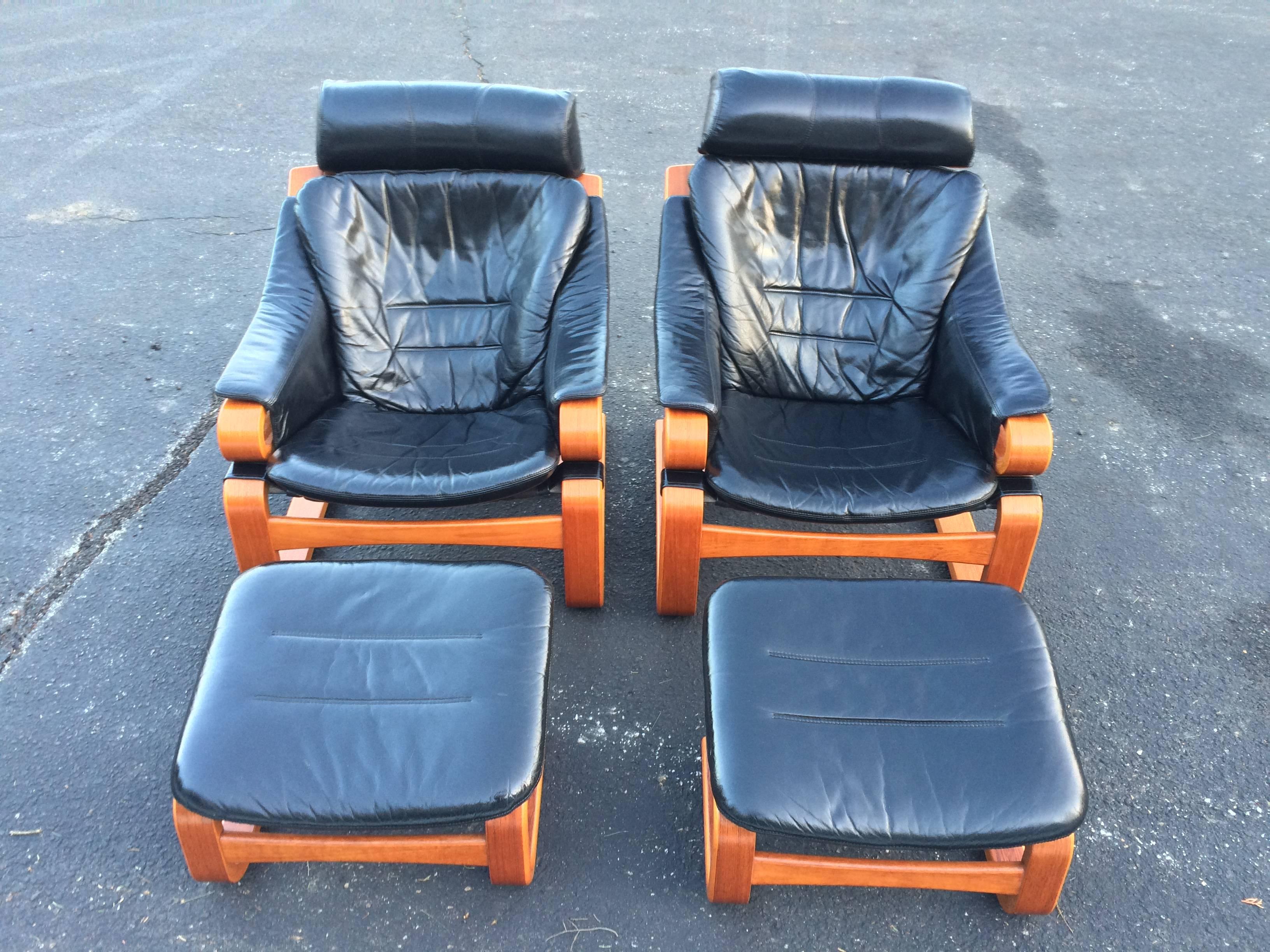 Pair of Danish Modern Leather Lounge Chairs with Ottomans 2