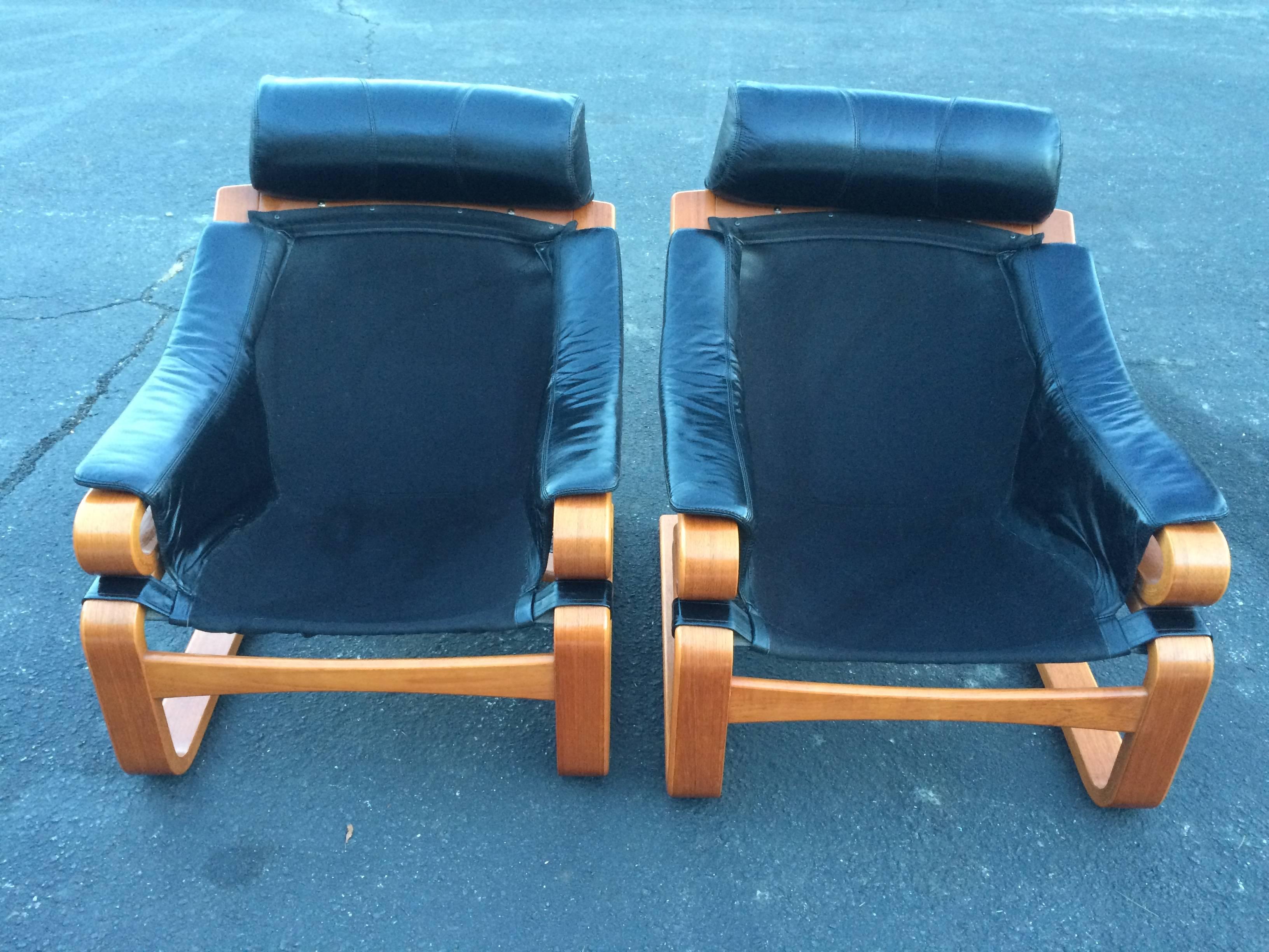 Pair of Danish Modern Leather Lounge Chairs with Ottomans 3