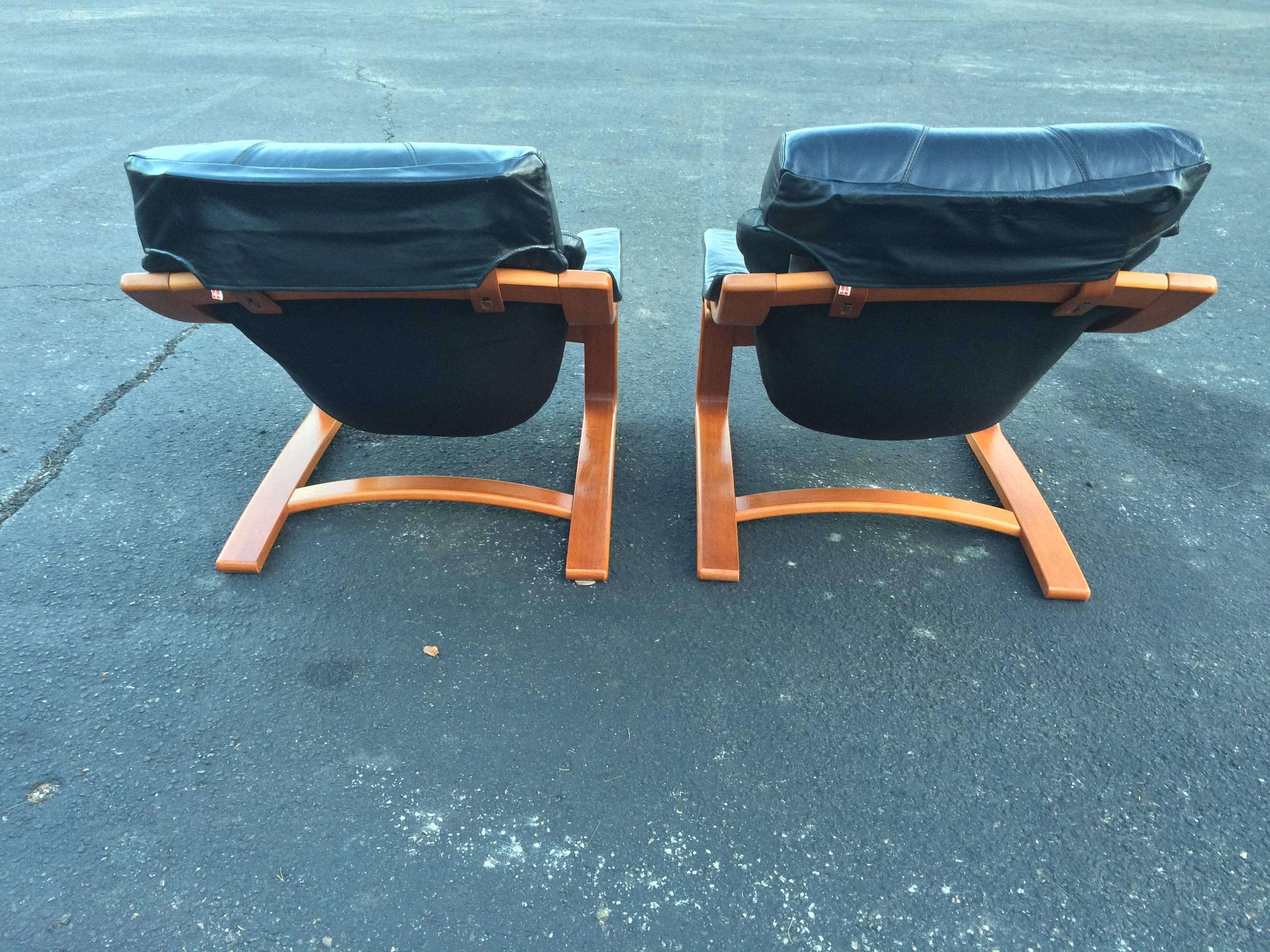 Pair of Danish Modern Leather Lounge Chairs with Ottomans 5