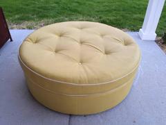 Tufted Round Yellow Ottoman on Brass Castors
