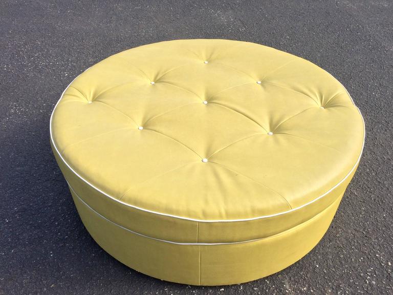 Tufted Round Yellow Ottoman on Brass Castors at 1stdibs