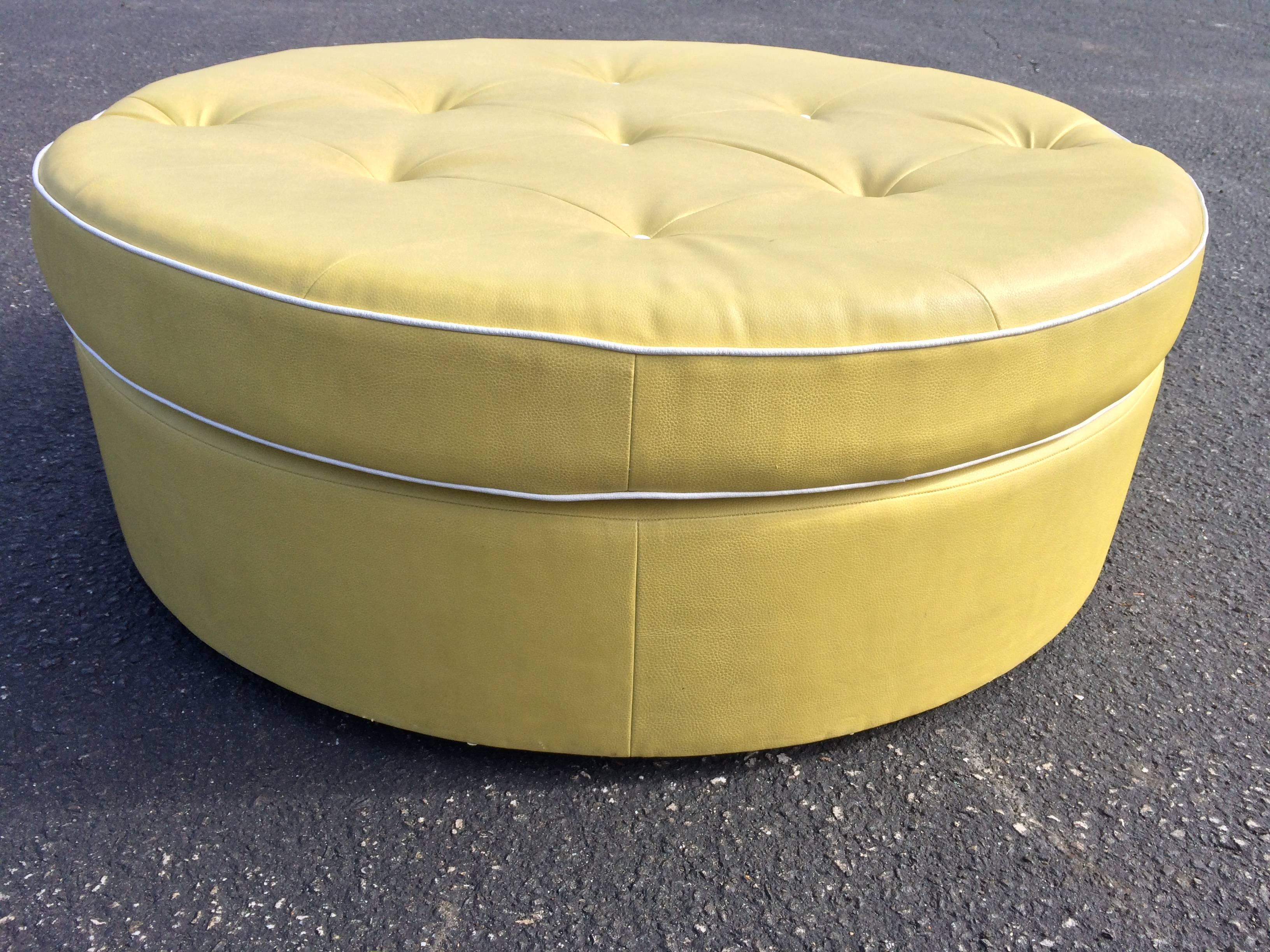 Tufted Round Yellow Ottoman on Brass Castors In Good Condition In Redding, CT
