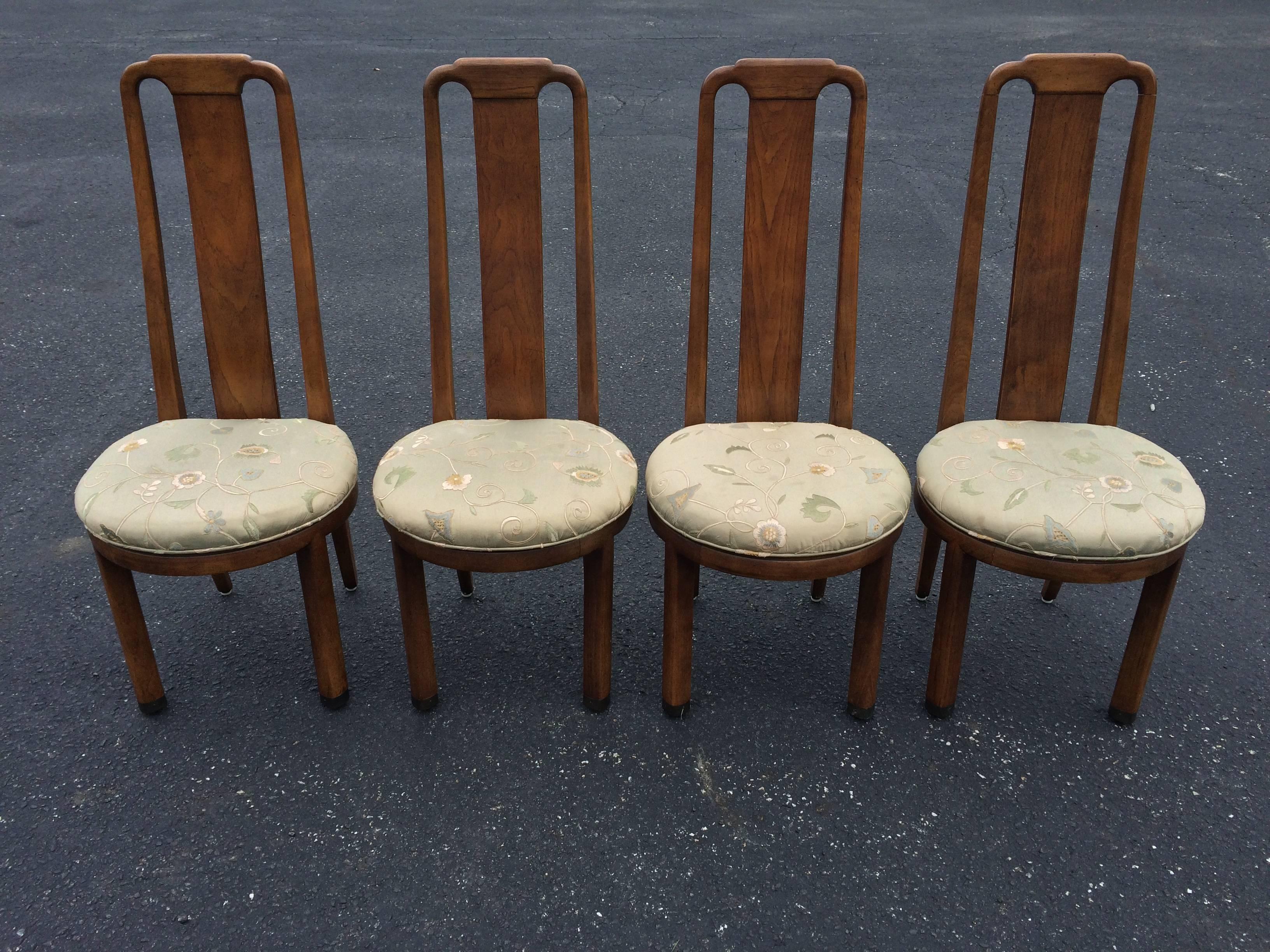 Set of Four High Back Henredon Dining Chairs. Great Mid Century- Hollywood Regency  Styling and shape. Round seat is covered in a floral silk but can easily be replaced. Brass fitted caps on feet of chairs. Very elegant for any table. Please confirm