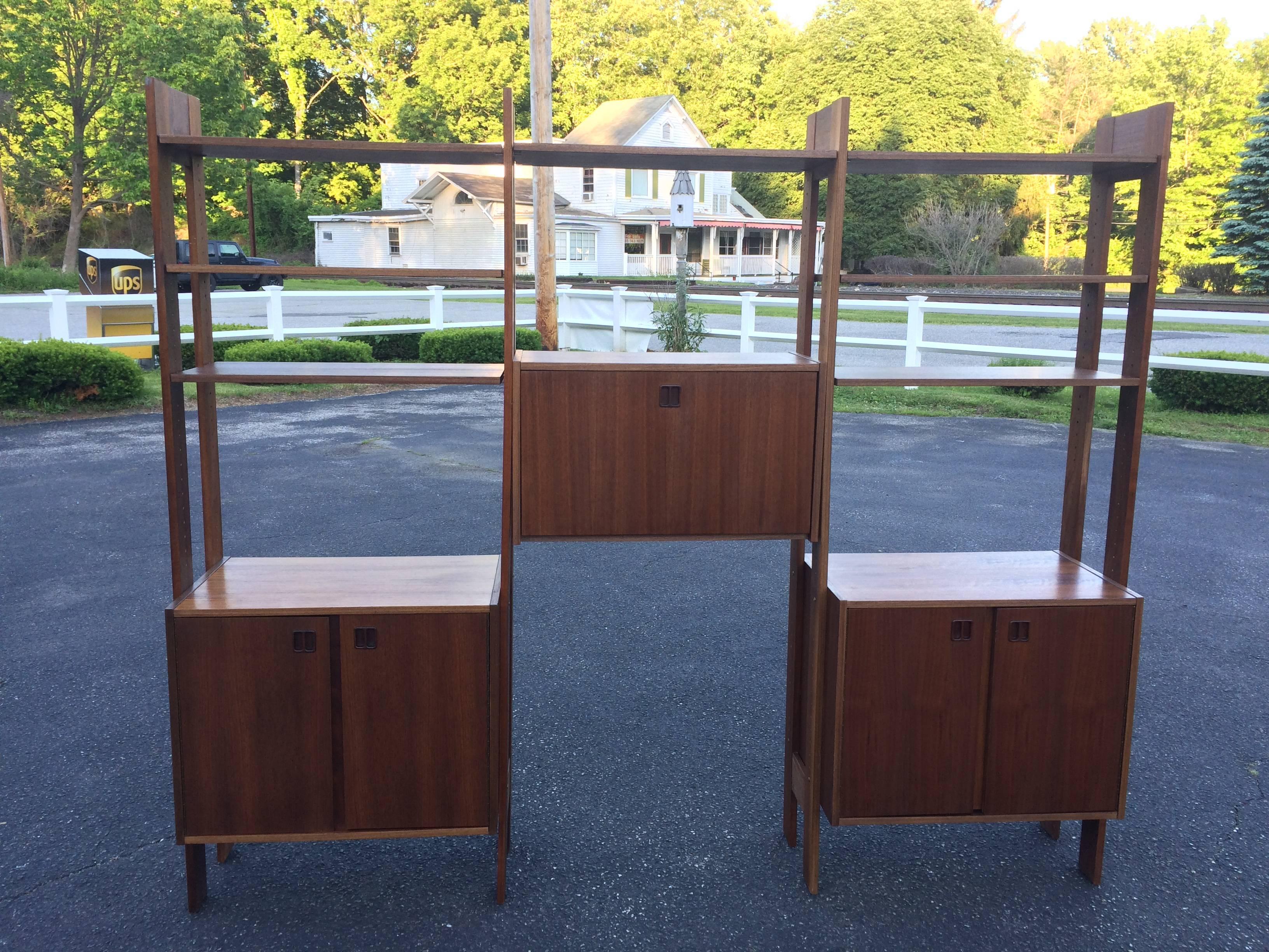 Poul Cadovious Style Danish Teak Wall Unit with finished back In Good Condition In Redding, CT