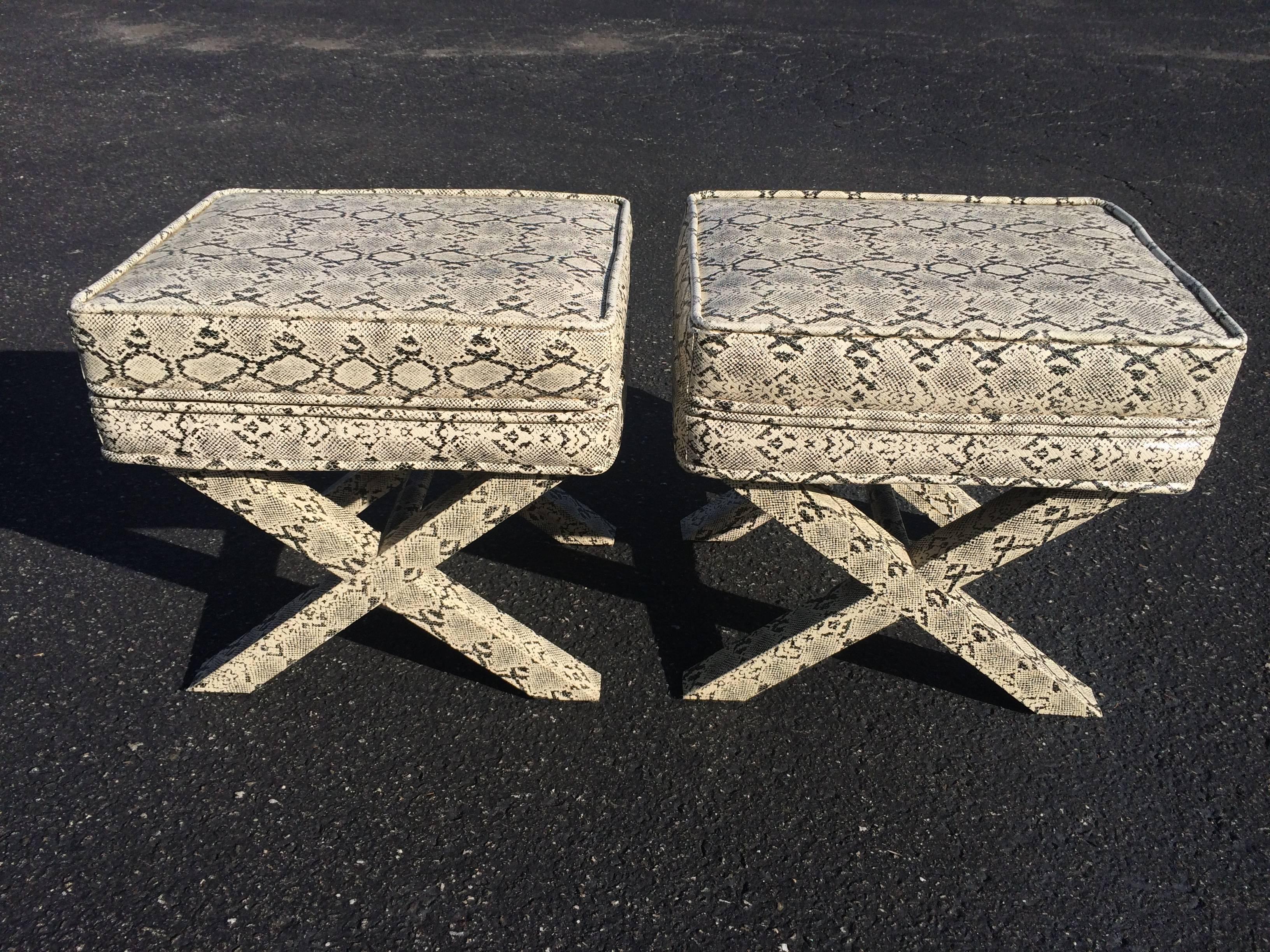 Pair of faux snake skin X-base parsons stools. 
Measures: 20.50 W x 16.50 D x 19 H. If you love the look of animal prints than these are for you. Use as an ottoman, table or stool.
