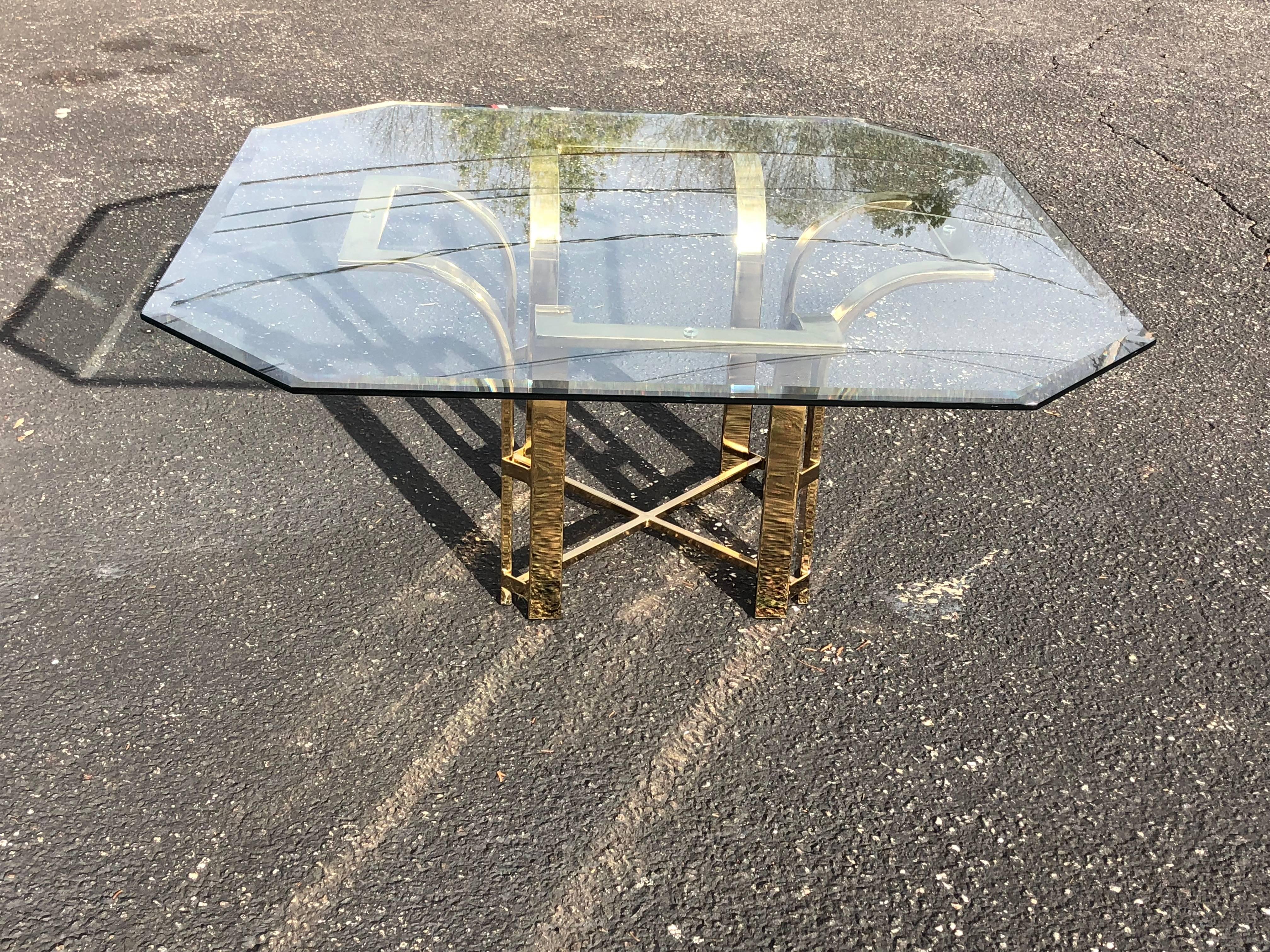 Hollywood Regency brass and glass coffee table. Stunning Octagonal glass top with one inch beveled glass.  The glass top is 39