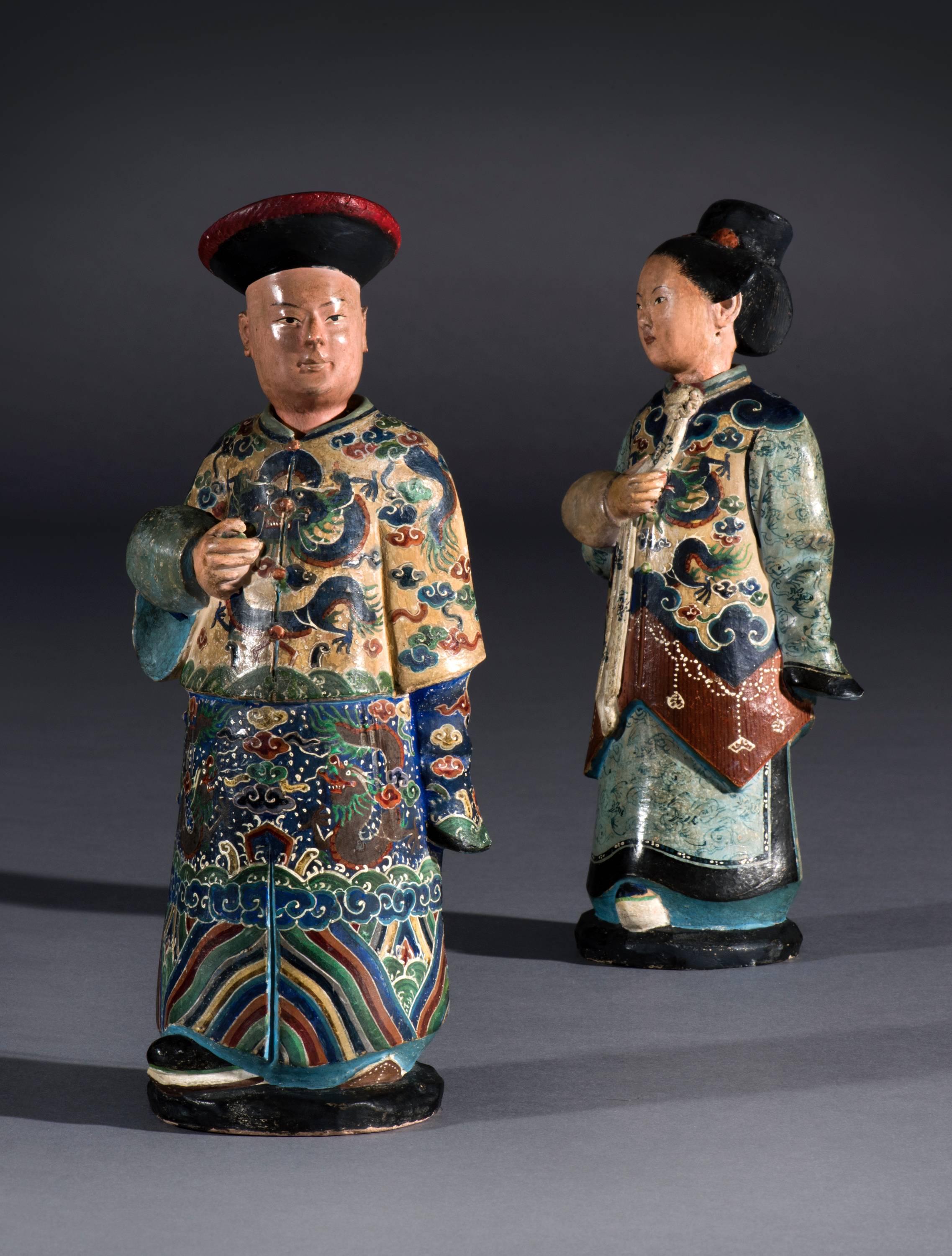 Rare pair of early 19th century Chinese painted clay nodding figures.