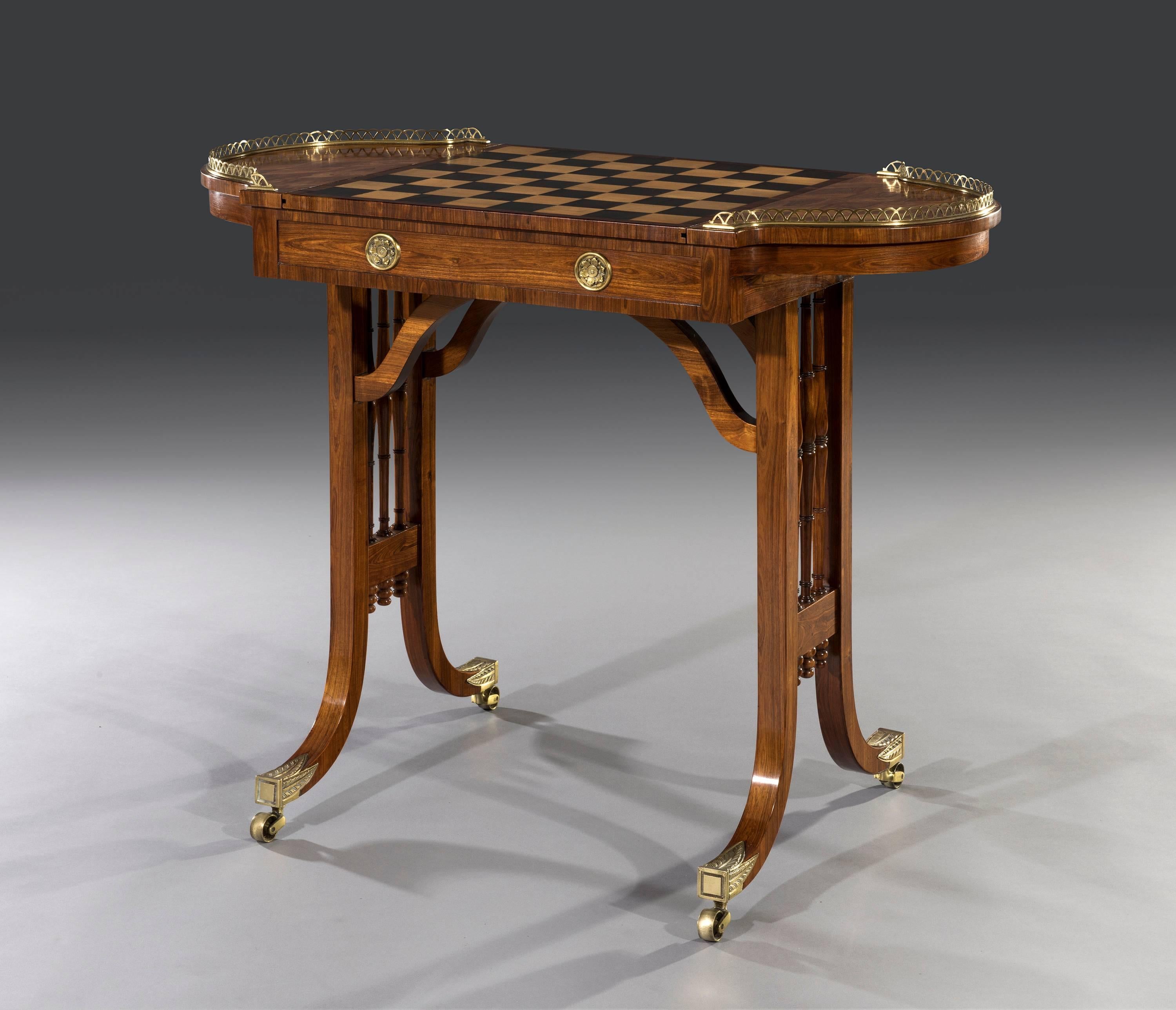 Early 19th century Regency period kingwood parquetry reversible games table.