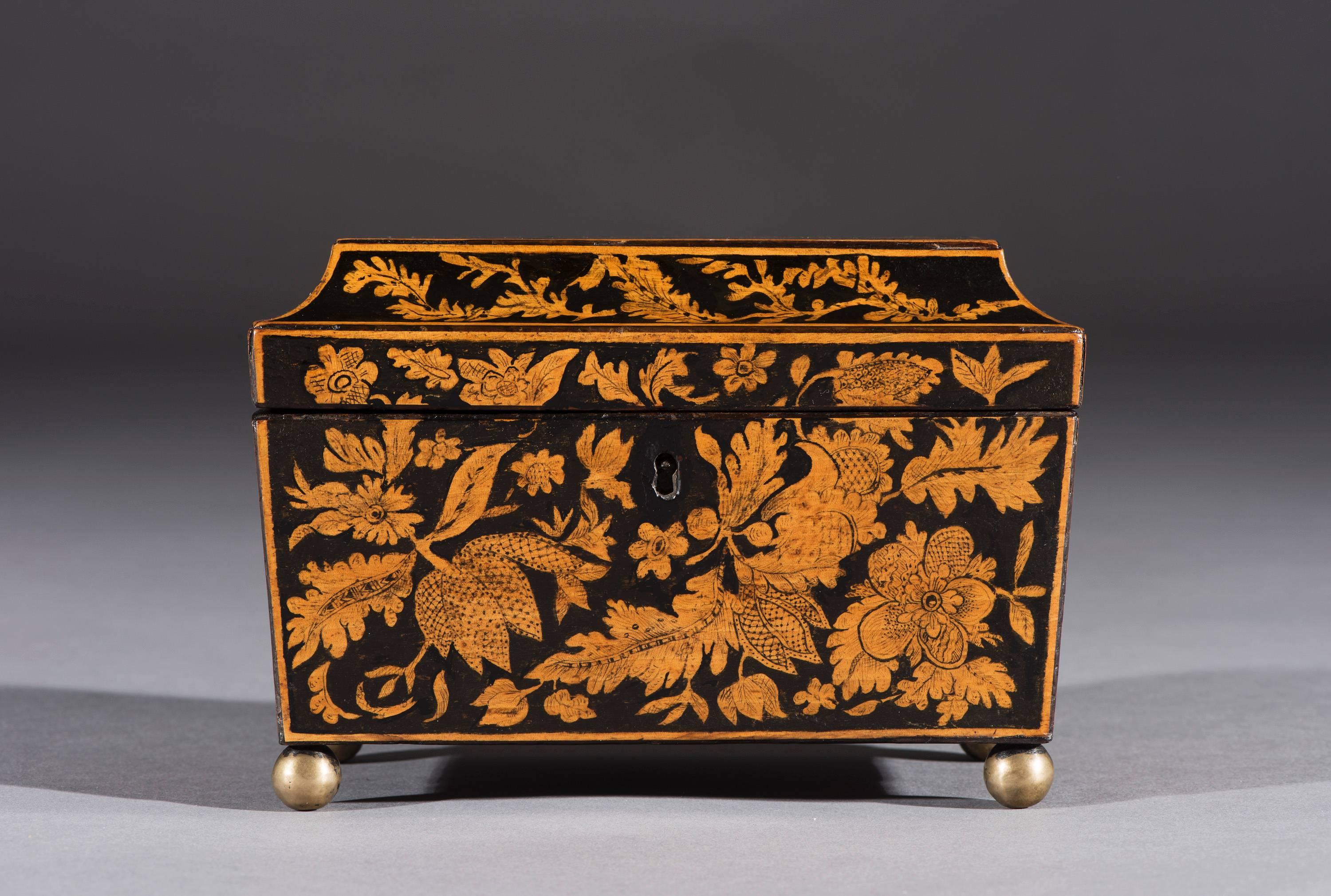 Early 19th century Regency penwork tea caddy of rare small size.