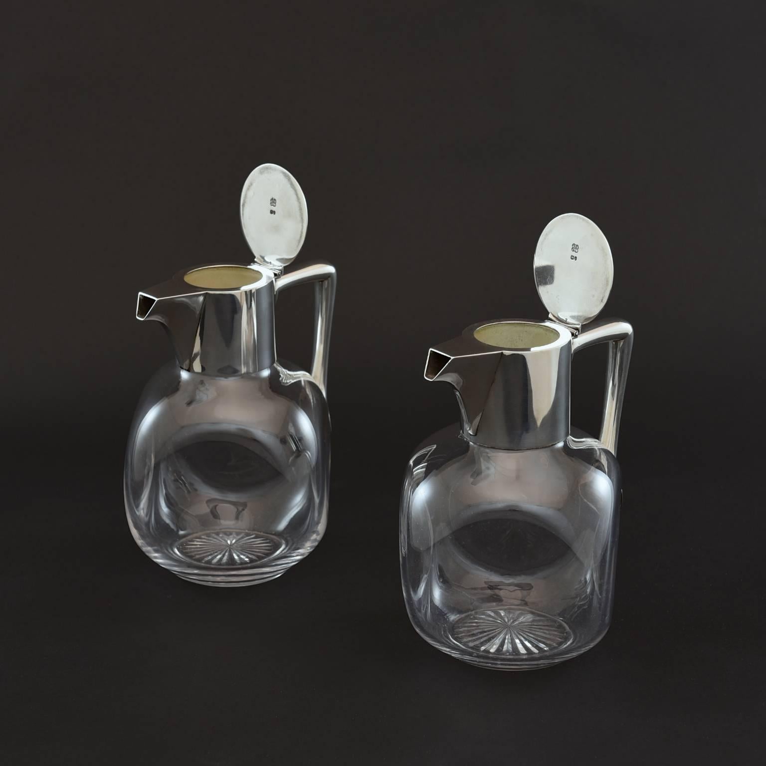 British Pair of Silver and Cut-Glass Claret Jugs