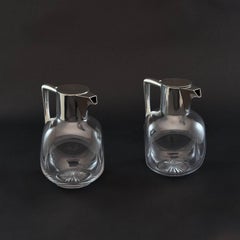 Pair of Silver and Cut-Glass Claret Jugs