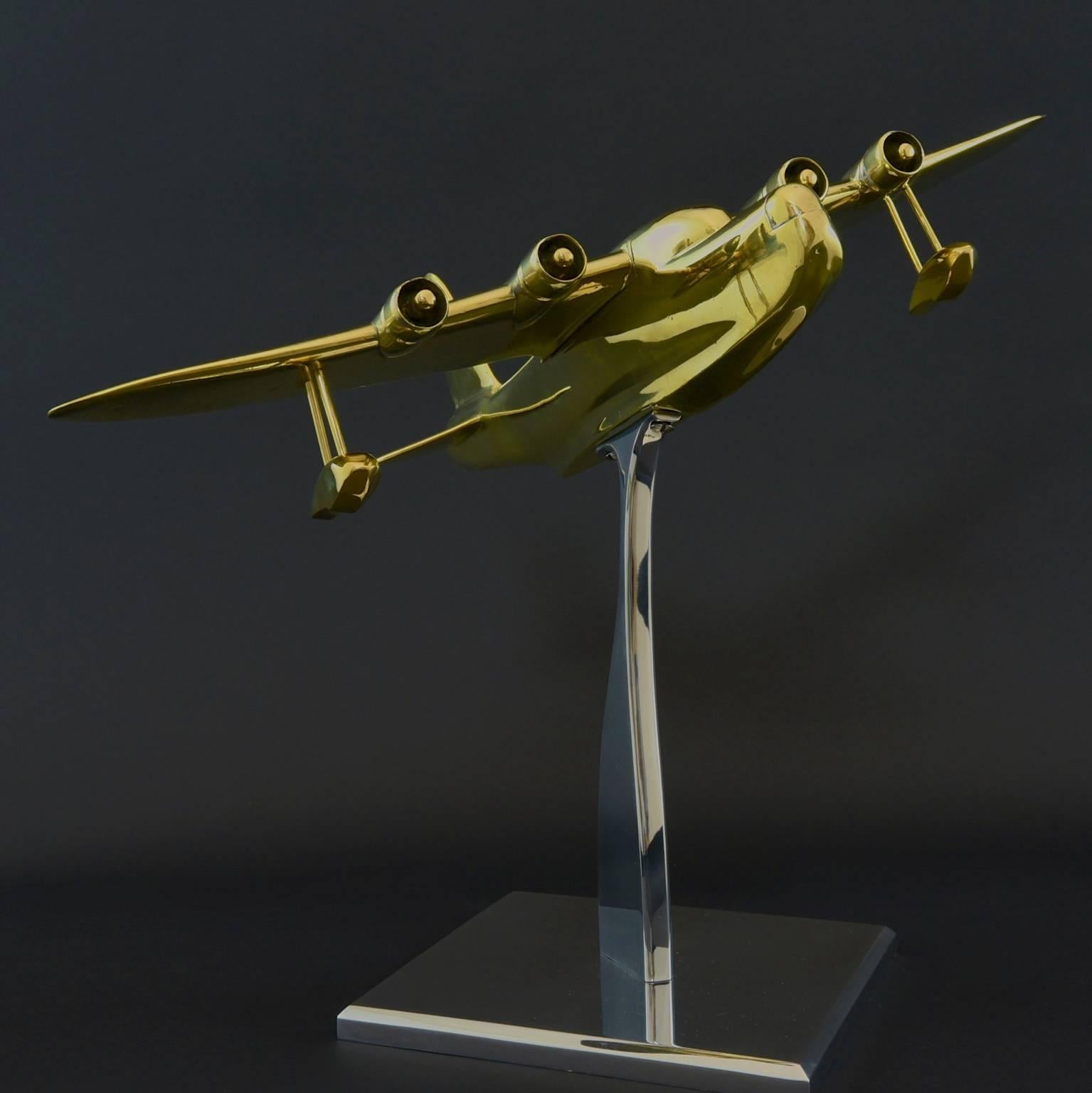 Amazing solid cast brass model of a Short Brothers Sunderland flying boat patrol bomber, circa 1940 on newly made aluminium stand.

One of the most outstanding British seaplanes ever built, the Sunderland was one of the most powerful and widely used