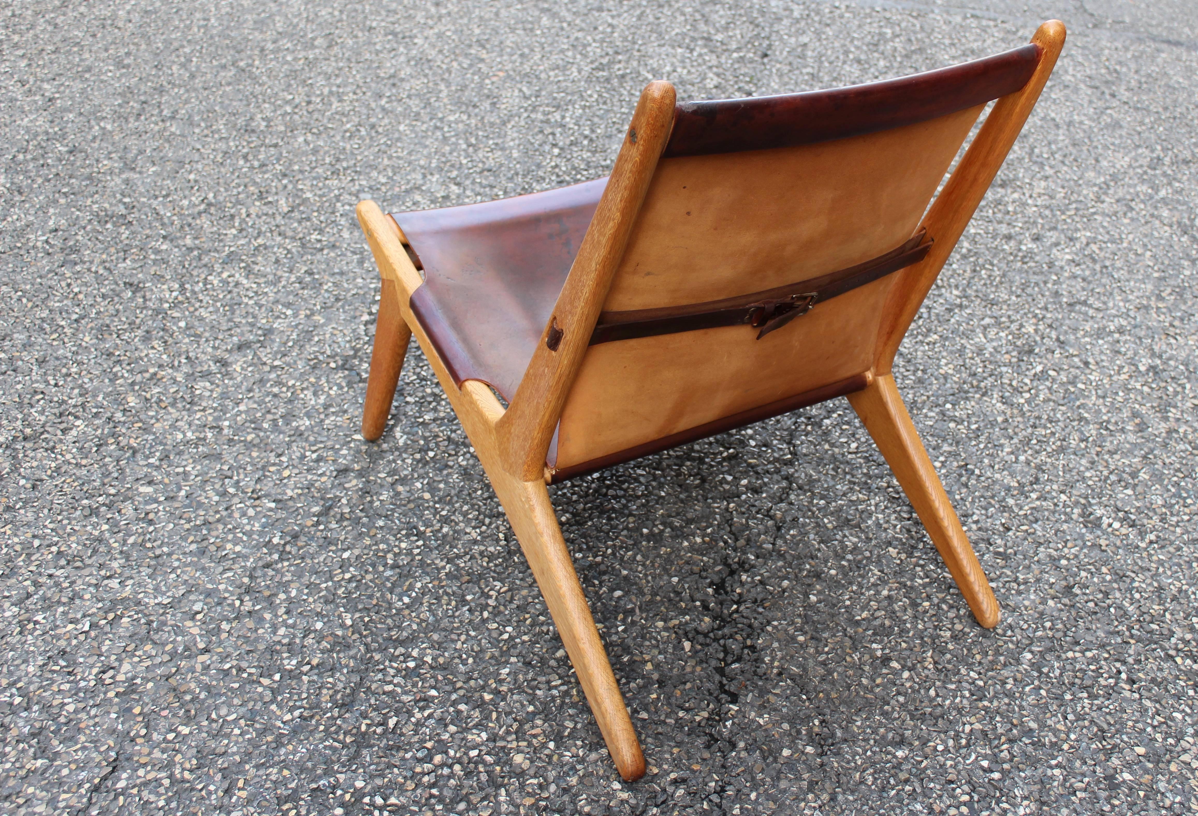Pair of Swedish 1954 "Hunting Chair" model 204 b
Uno & Osten Kristiansson lounge chairs designed for Vittsjo¨mo¨Bel, made of a oakwood frame with brown original leather seat, Sweden.