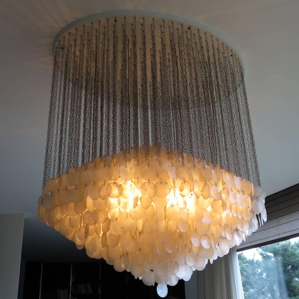 An original Fun 7DM chandelier by Verner Panton hanging lamp, two cluster Manufacturer, J. Luber Ag Switzerland Materials: Small discs of shell, metal 1964.