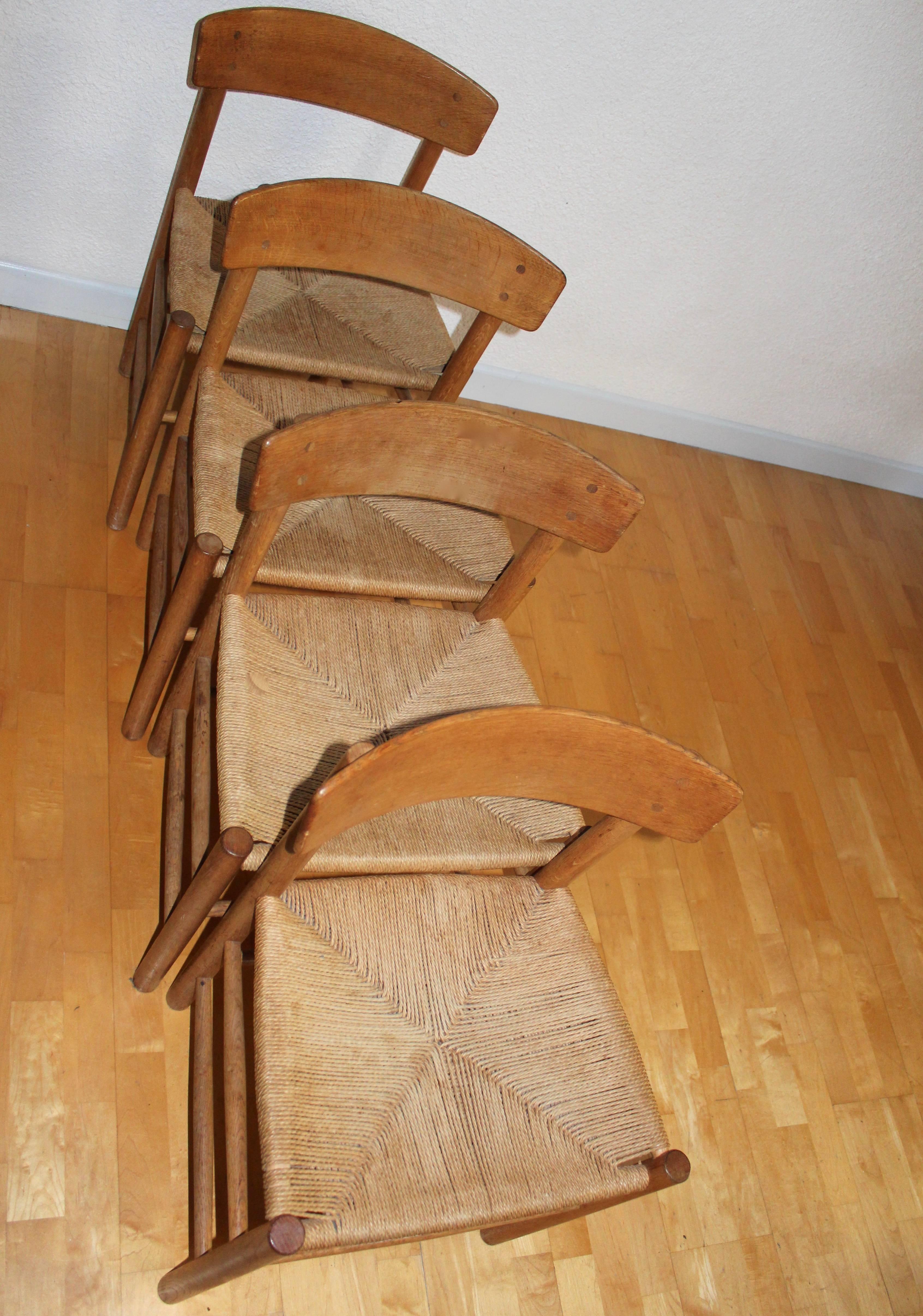 Danish modern woven Shaker style cord seat dining chairs four by Børge Mogensen.