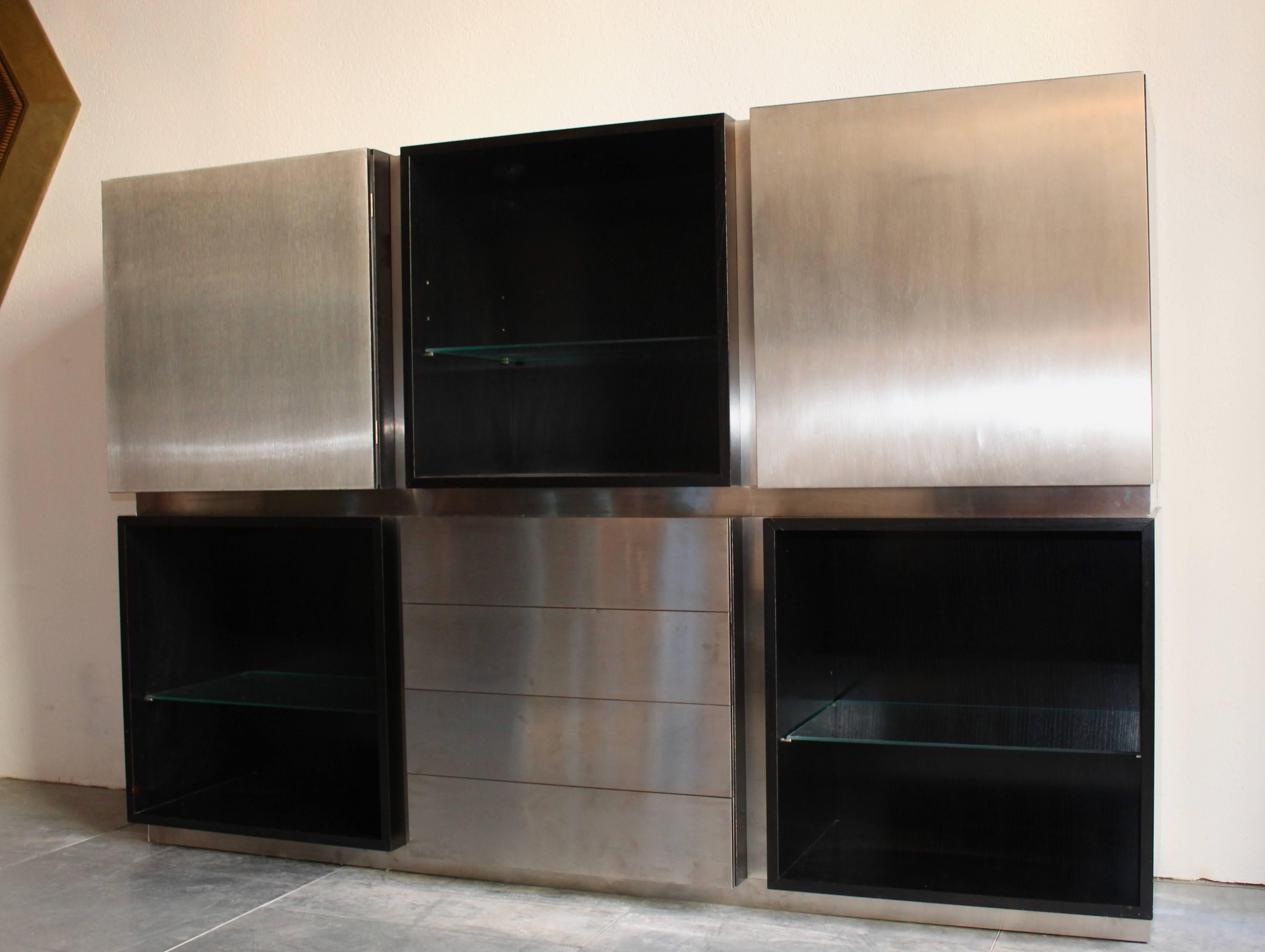 Acerbis sideboard in stained oak and stainless steel, Italy, 1970s.
Beautiful black oak furniture and stainless steel door, possibility to modulate the furniture.