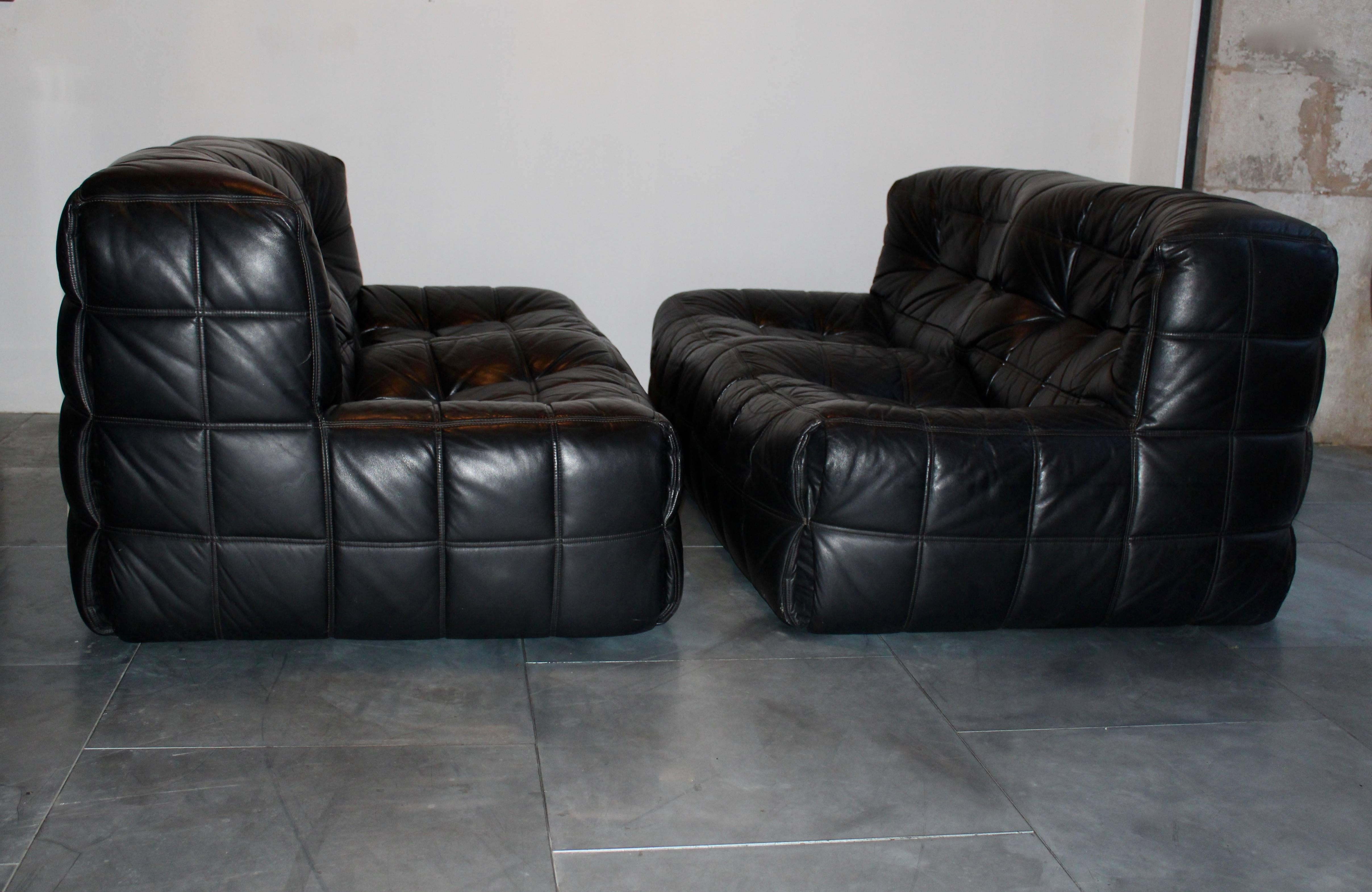 Michel Ducaroy a pair of Kashima leather sofa Ligne Roset France
a pair of black leather two-seat Kashima sofa designed by Michel Ducaroy for Ligne Roset in 1976. 
Dimensions
29.92 in.Hx61.42 in.Wx37.8 in.D
76 cmHx156 cmWx96 cmD
Seat