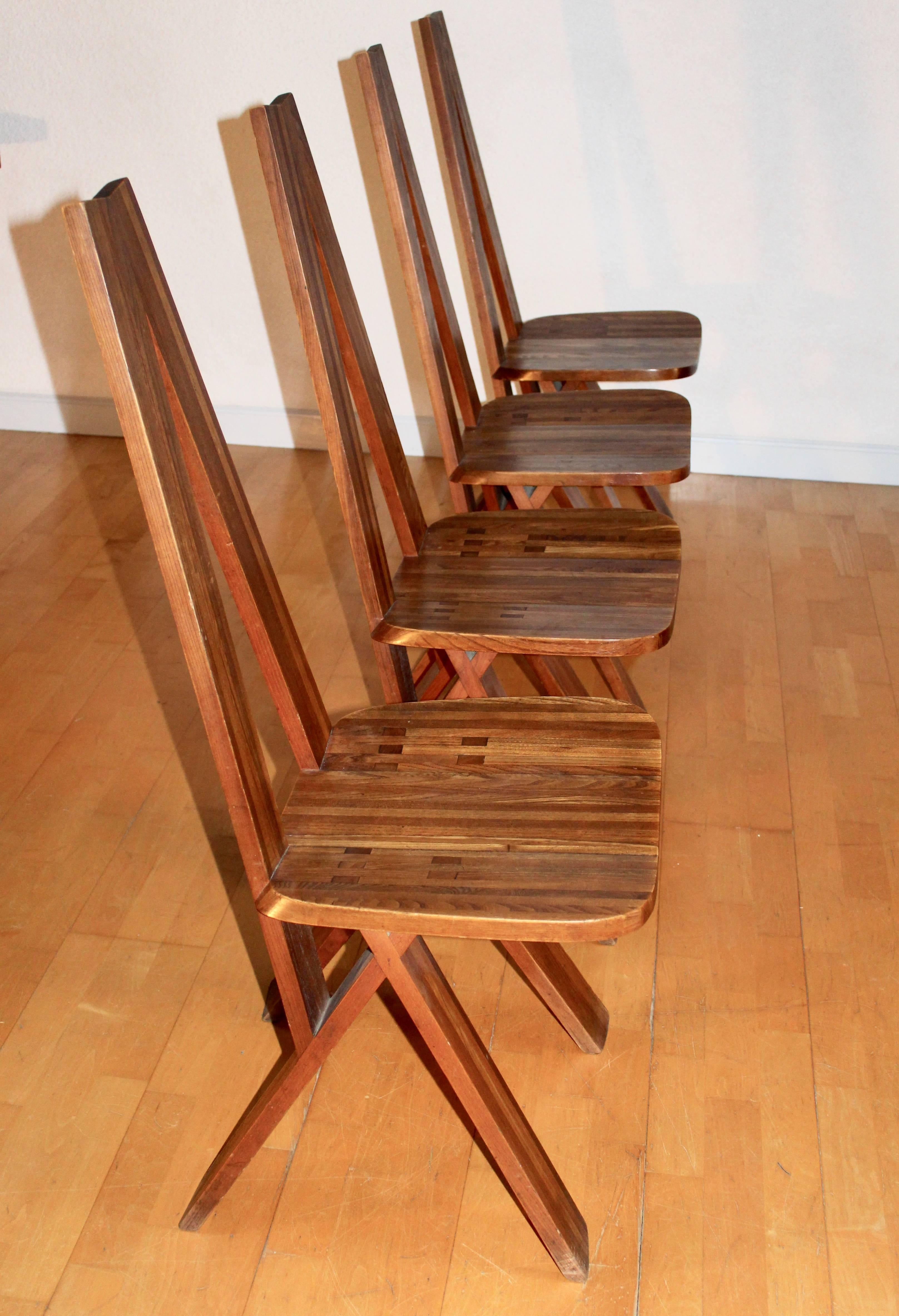 True sculpture and technical prowess for a chair of visual and graphic simplicity. All the expertise of Pierre Chapo bearer of a tradition of French cabinetmaker.
French elm, first edition of the early 1970s Beautiful patina, chairs from a cottage