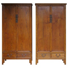 Pair of Antique Chinese Hardwood Tapered Two-Door Cabinets