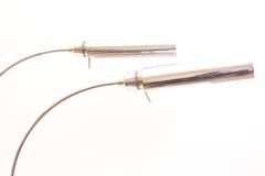 Lampes en forme d'arc en chrome et laiton pour Lancome