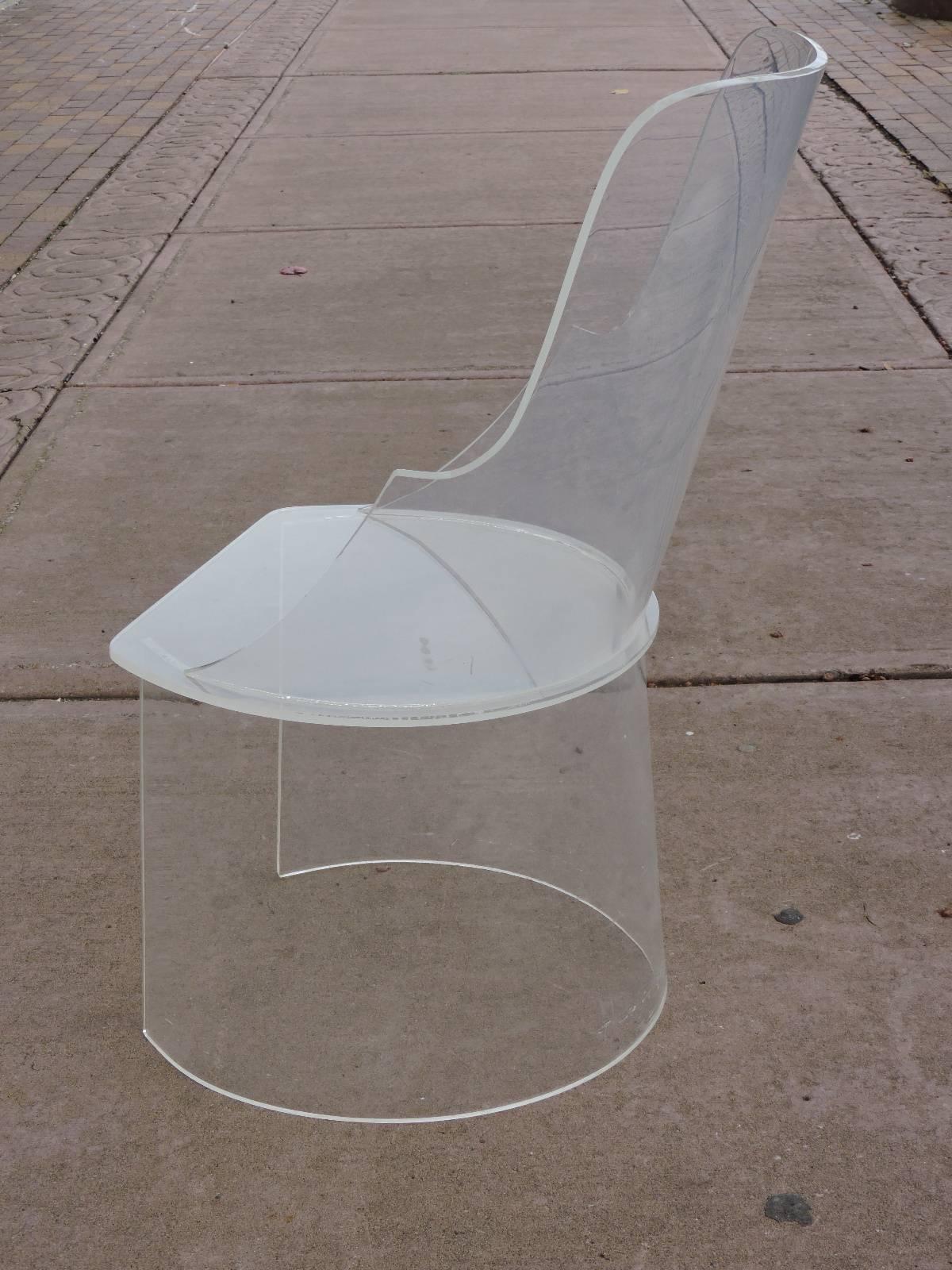   Tall barrel back lucite chair with a beautifully contoured sleek sculptural form. Look at all pictures and read condition report in comment section.
