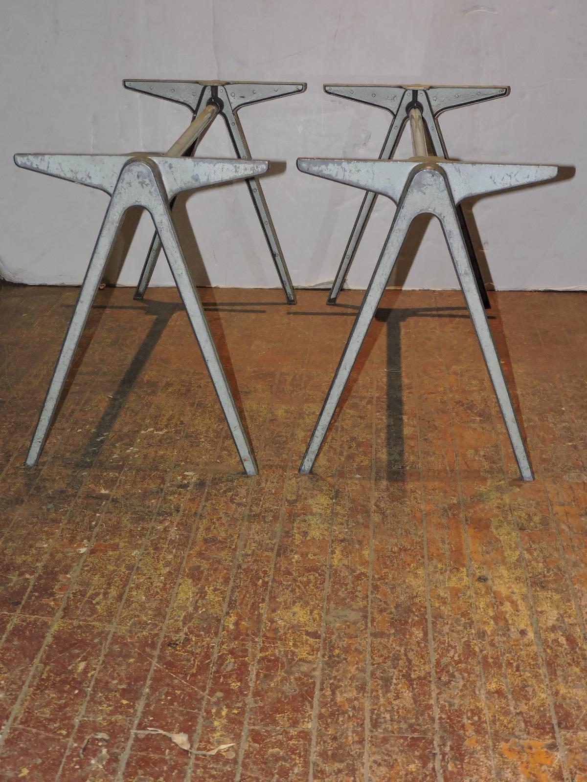 1940s modernist industrial aluminum compass table bases / benches by James Leonard for Esavian in the style of Jean Prouve  ( these were supposedly manufactured a few years earlier than the Prouve compass table design ). The ends with beautifully
