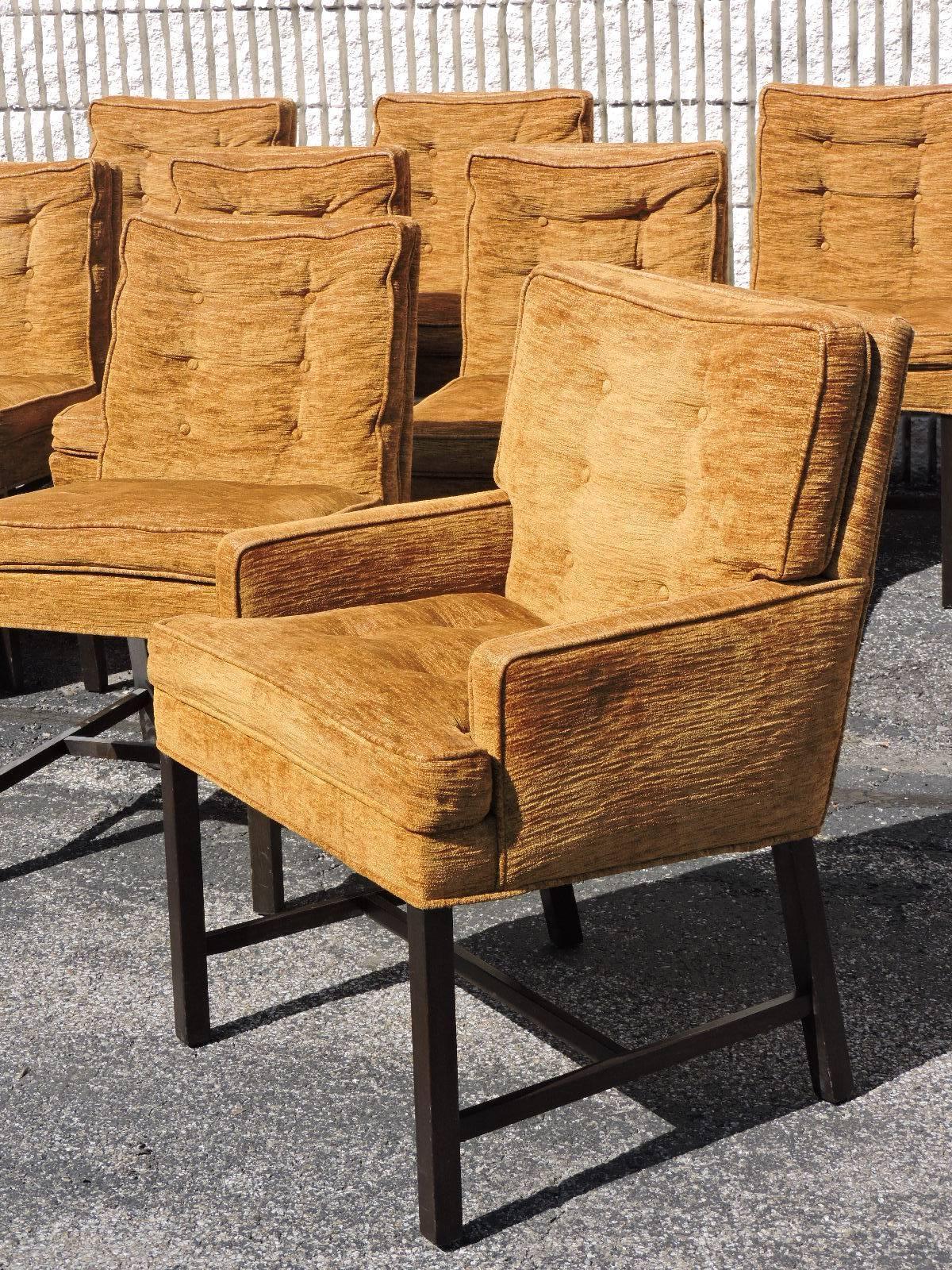 A hard to find set of 12 dining chairs by Harvey Probber for Directional consisting of ten side chairs - measuring (32
