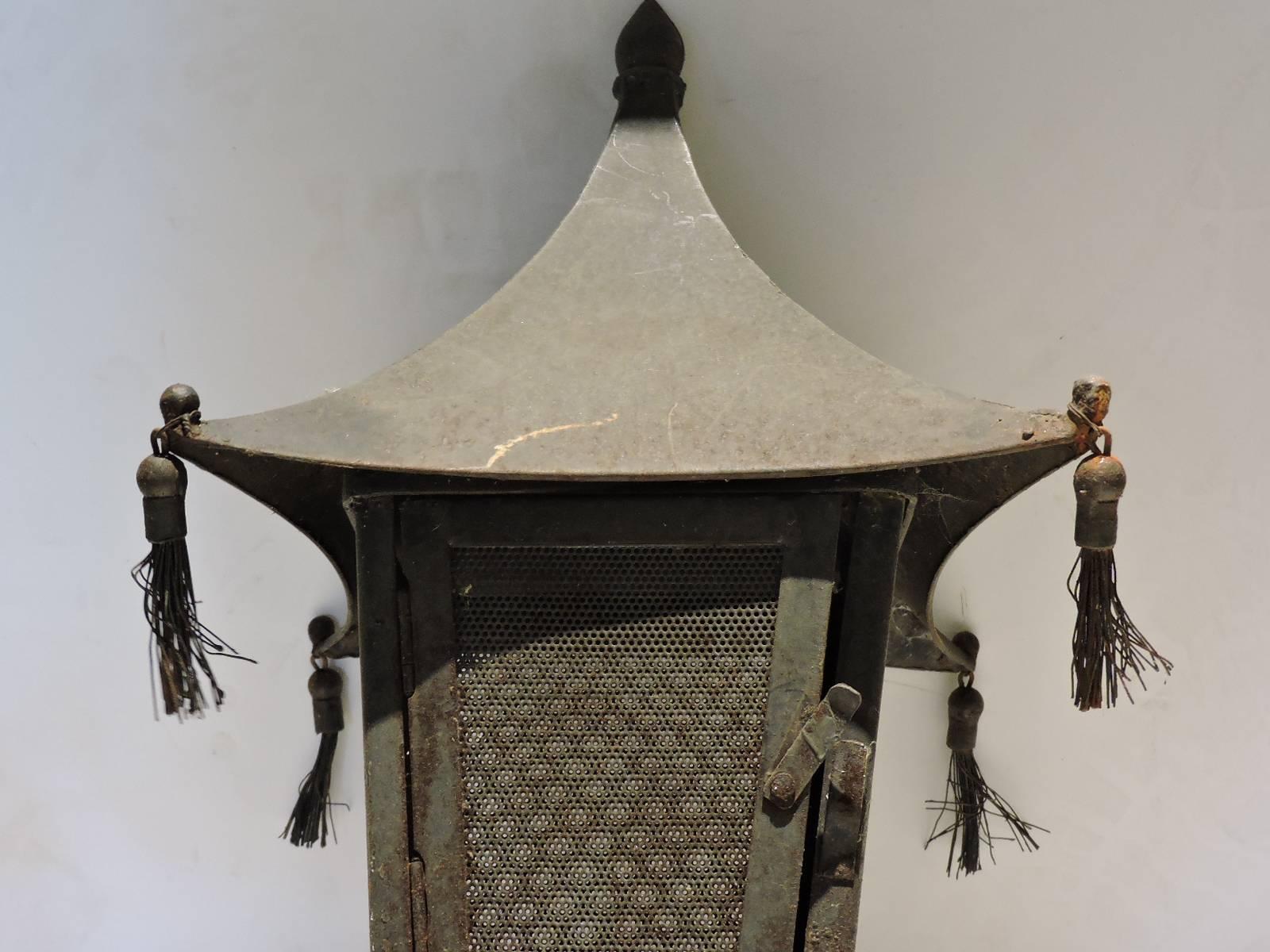 20th Century Pair of Tasseled Pagoda Form Candle Lanterns