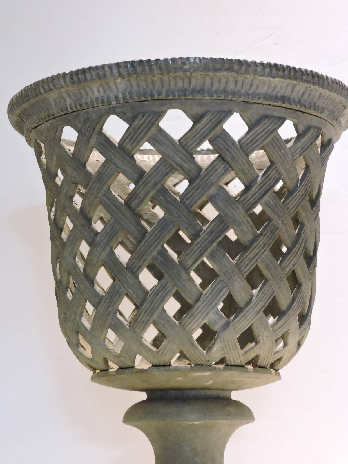 An exceptional quality and very heavy solid lead Campagna form finely detailed basket weave garden urn planter with nicely aged color to metal ware.