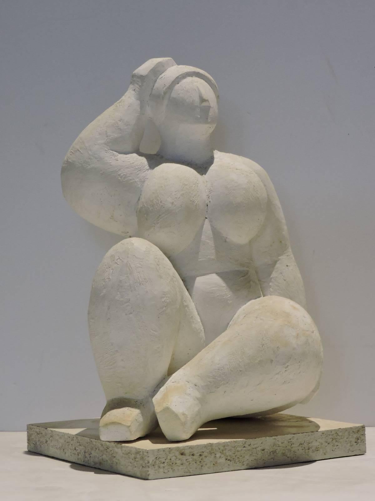 In the style of Fernando Botero - a carved solid white plaster artist sculpture of a nude woman with an exaggerated robust anatomical form, circa 1960.