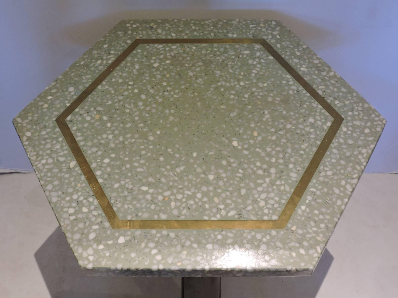 A pair of all original Harvey Probber designed side tables with hexagon shaped brass inlaid sea foam green terrazzo tops set on three very dark mahogany curved wood legs, circa 1960s.