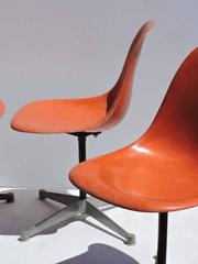 Eames for Herman Miller Orange Fiberglass Swivel Shell Chairs