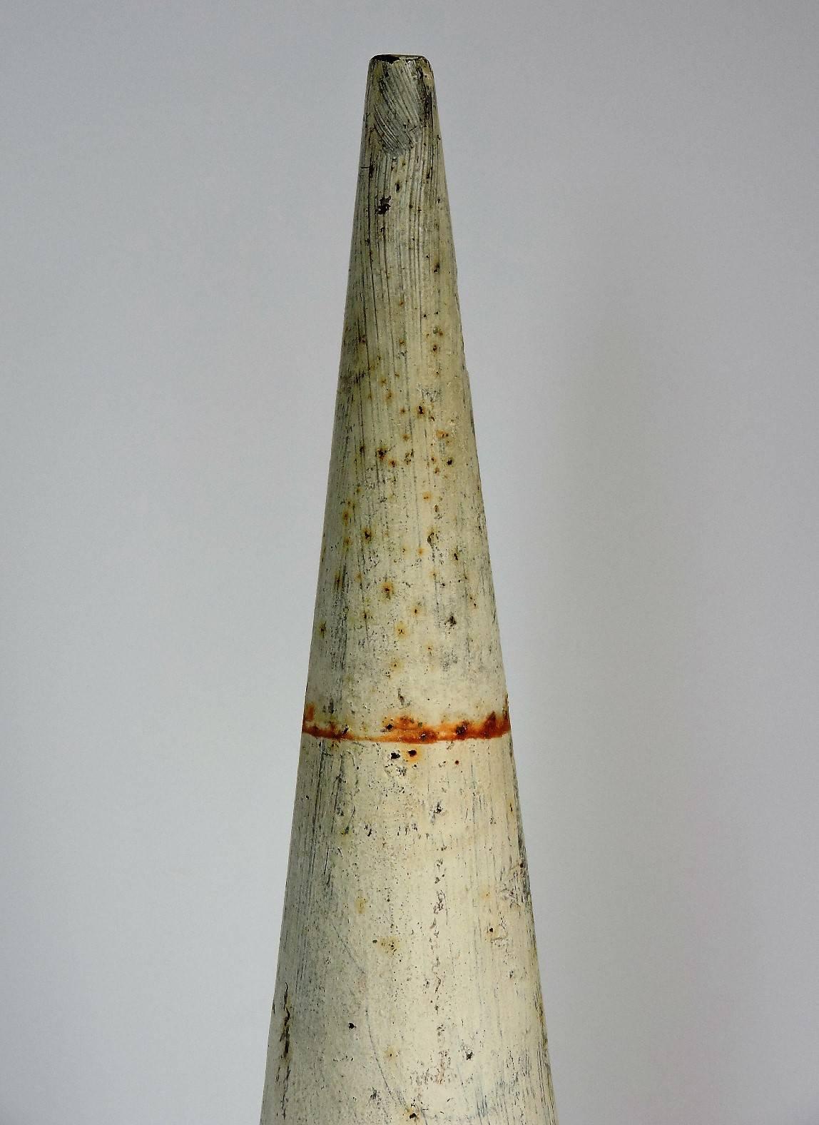 Antique Industrial blacksmith metalworker sculptor tall cone form steel mandrel in old worn white painted surface, circa 1900.