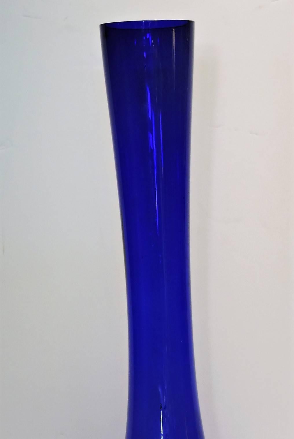 A 31 inch tall and sculptural cobalt blue modernist blown art glass vase, made in Sweden (see - foil label at bottom) - most likely by Arthur Percy dating from 1950-1960.
