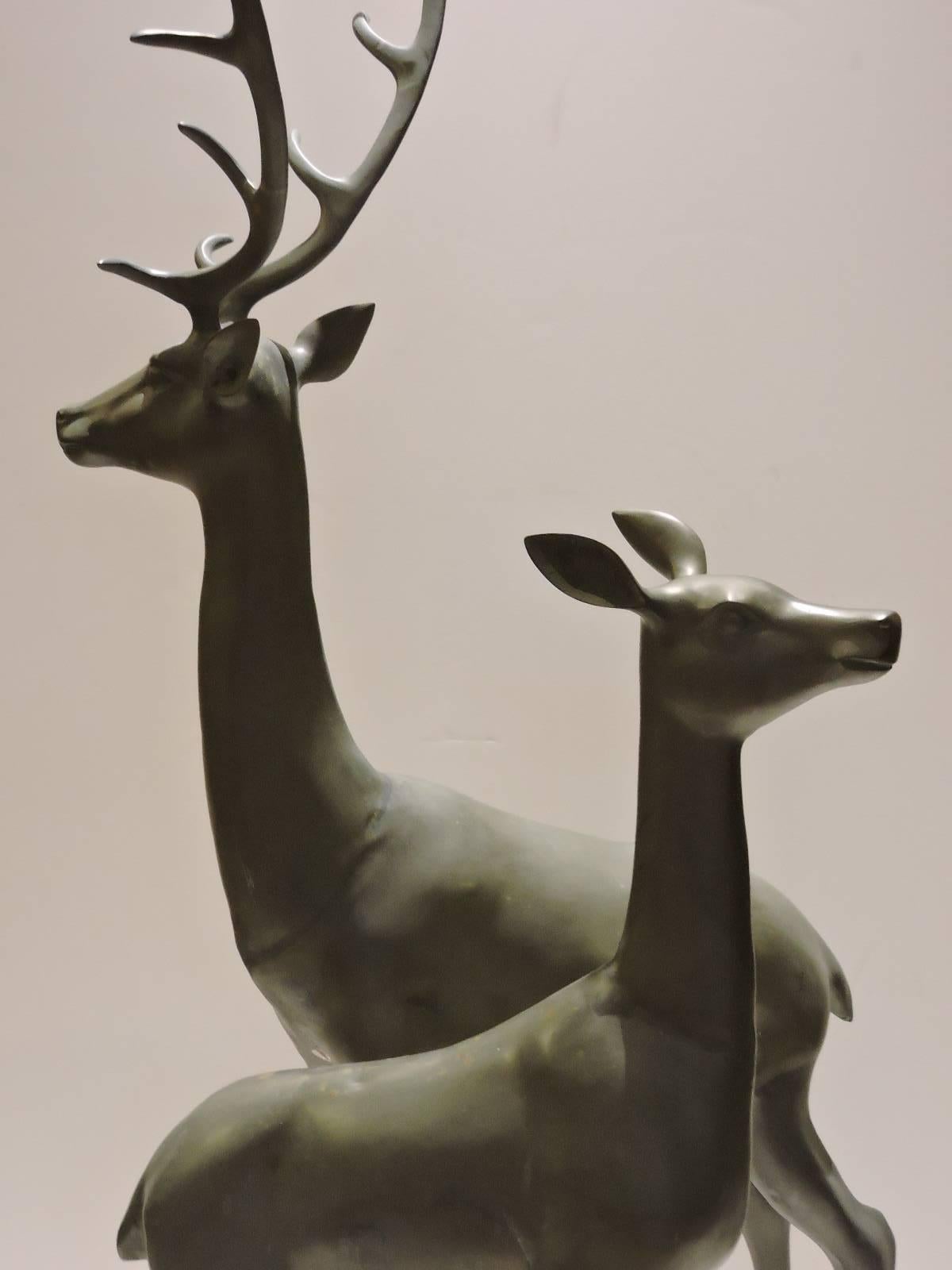 20th Century Pair of Hollywood Regency Large Bronzed Brass Deer Statues