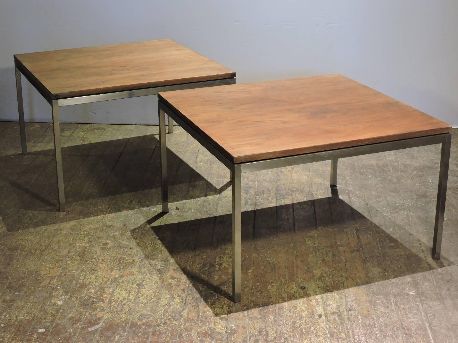 A pair of all original early production Florence Knoll minimalist designed solid steel tables with floating walnut tops. Both tables with Knoll Associates, Park Avenue NYC labels on underside of tops - circa 1950's.
Please look at all the pictures.